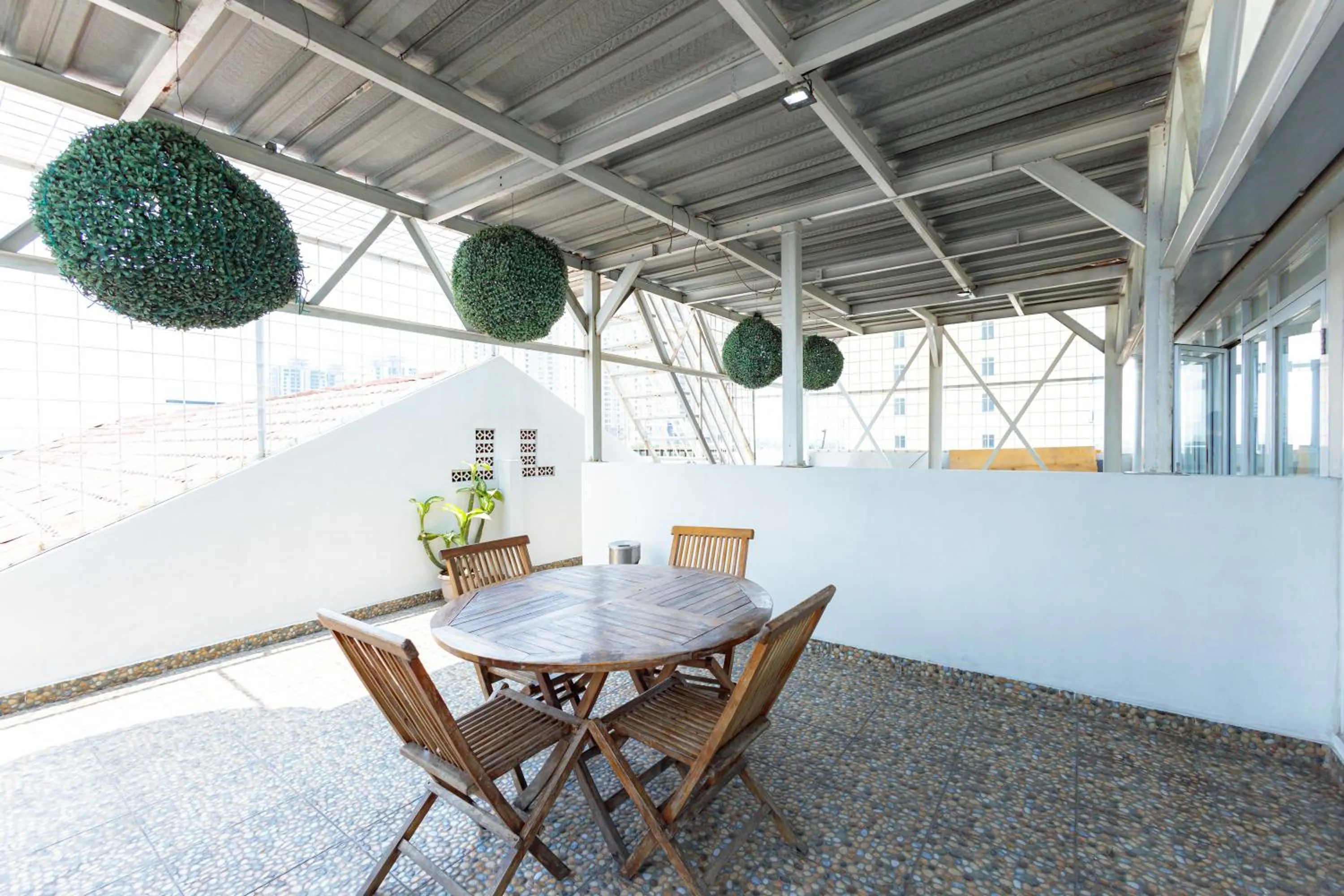 Seating area in Sans Hotel Liv Ancol by RedDoorz