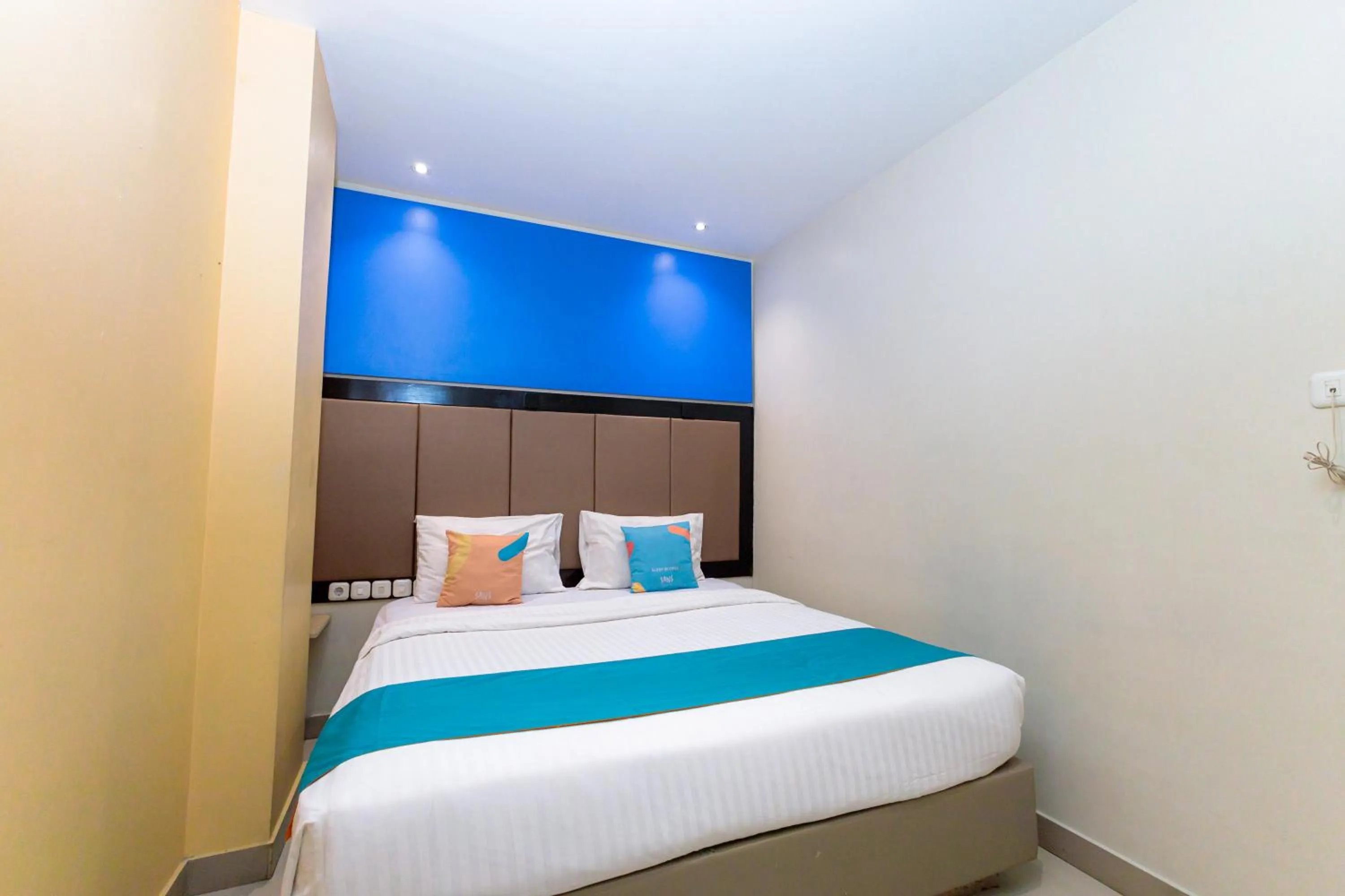 Bedroom, Bed in Sans Hotel Liv Ancol by RedDoorz