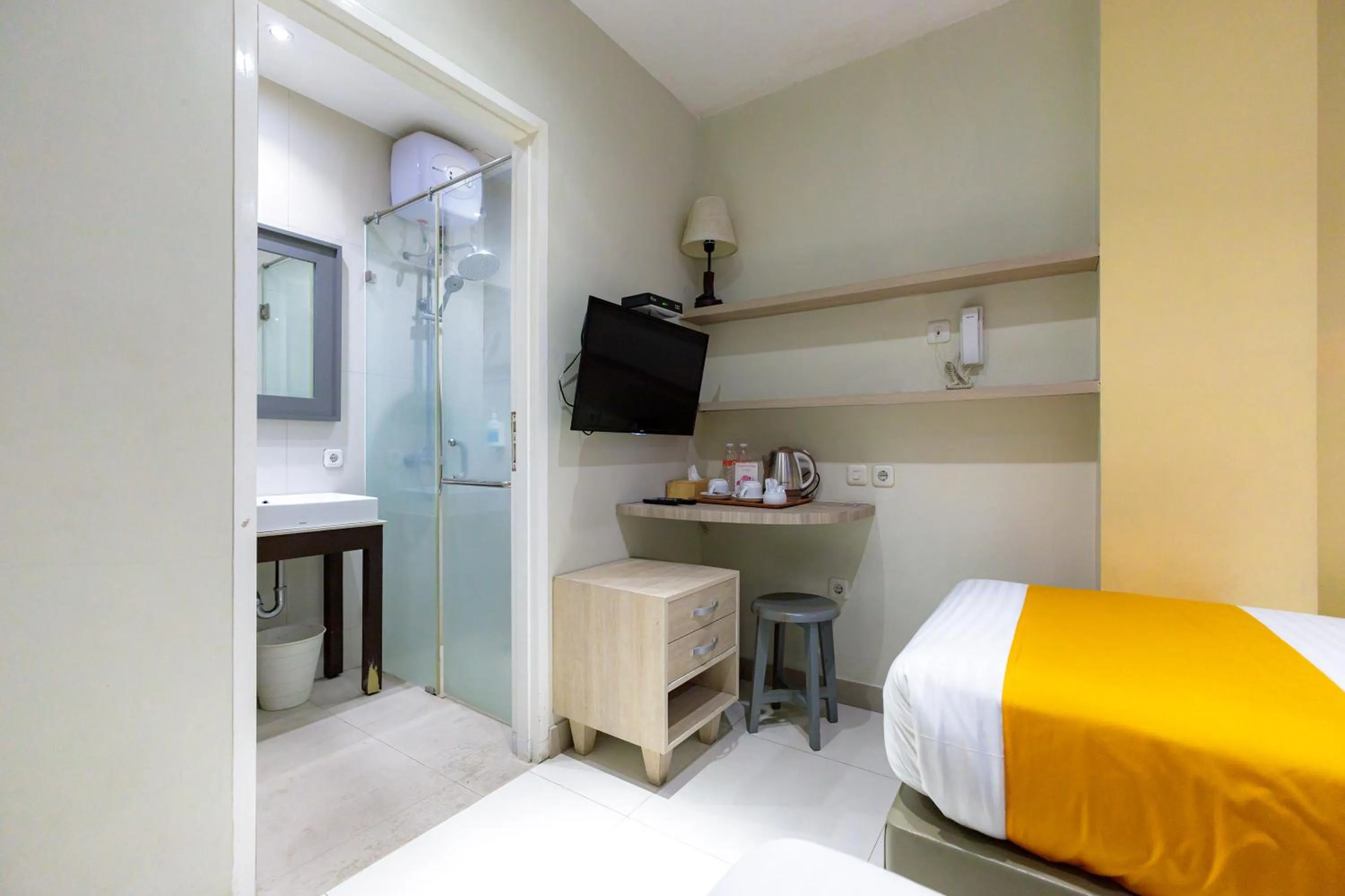Bedroom, Bed in Sans Hotel Liv Ancol by RedDoorz