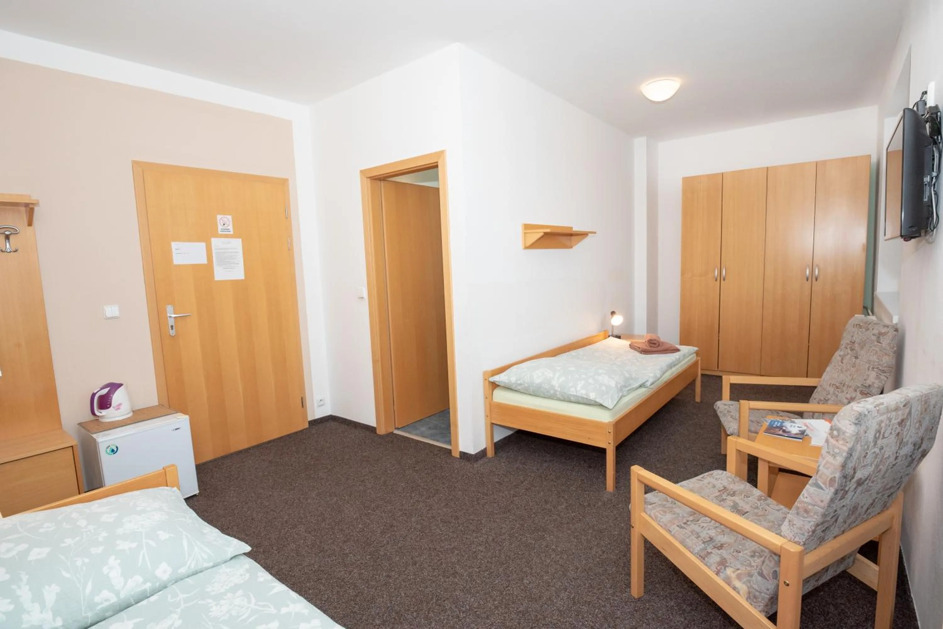 Bed in PENZION MAXIM