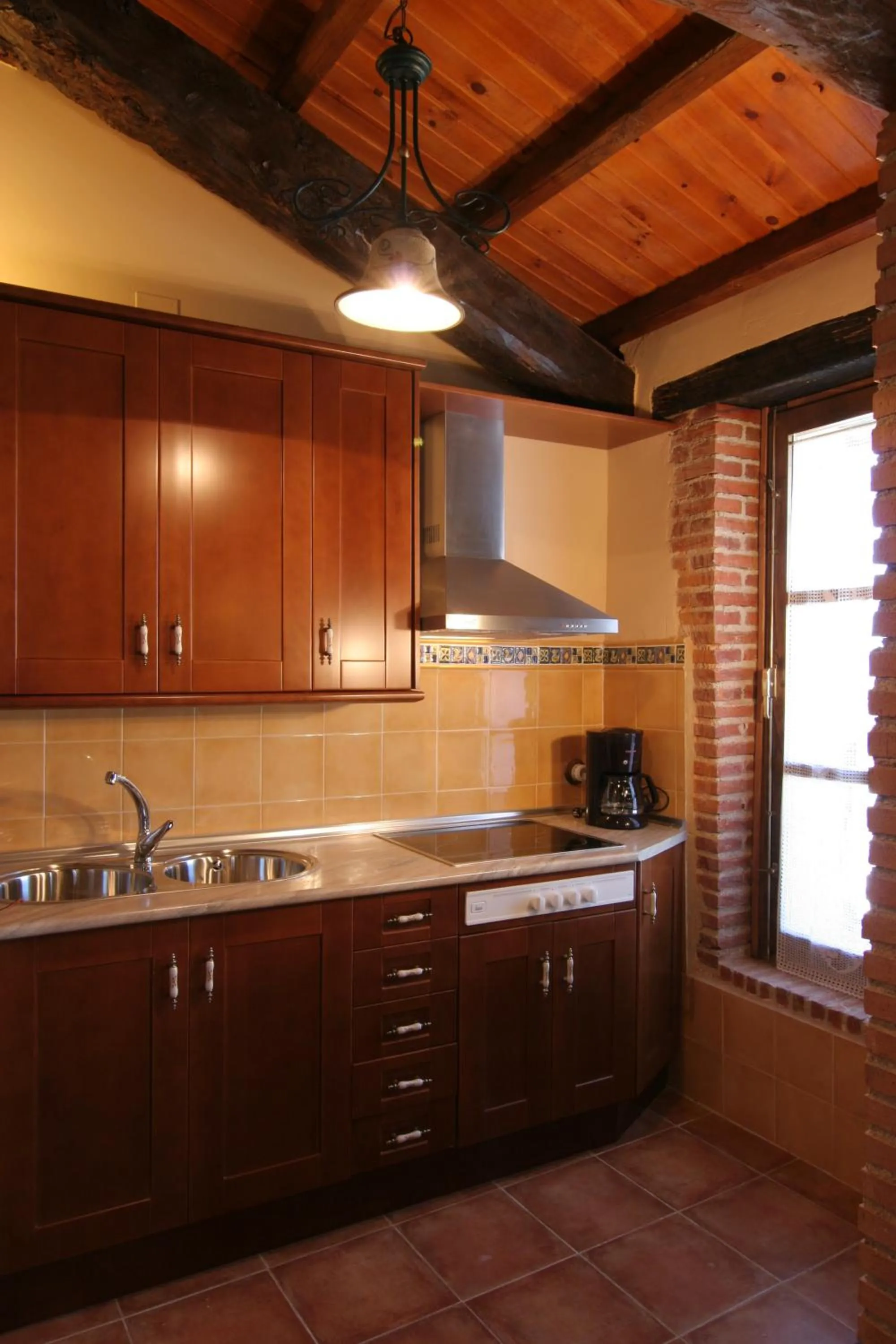 Kitchen or kitchenette in Casa Rural El Molino