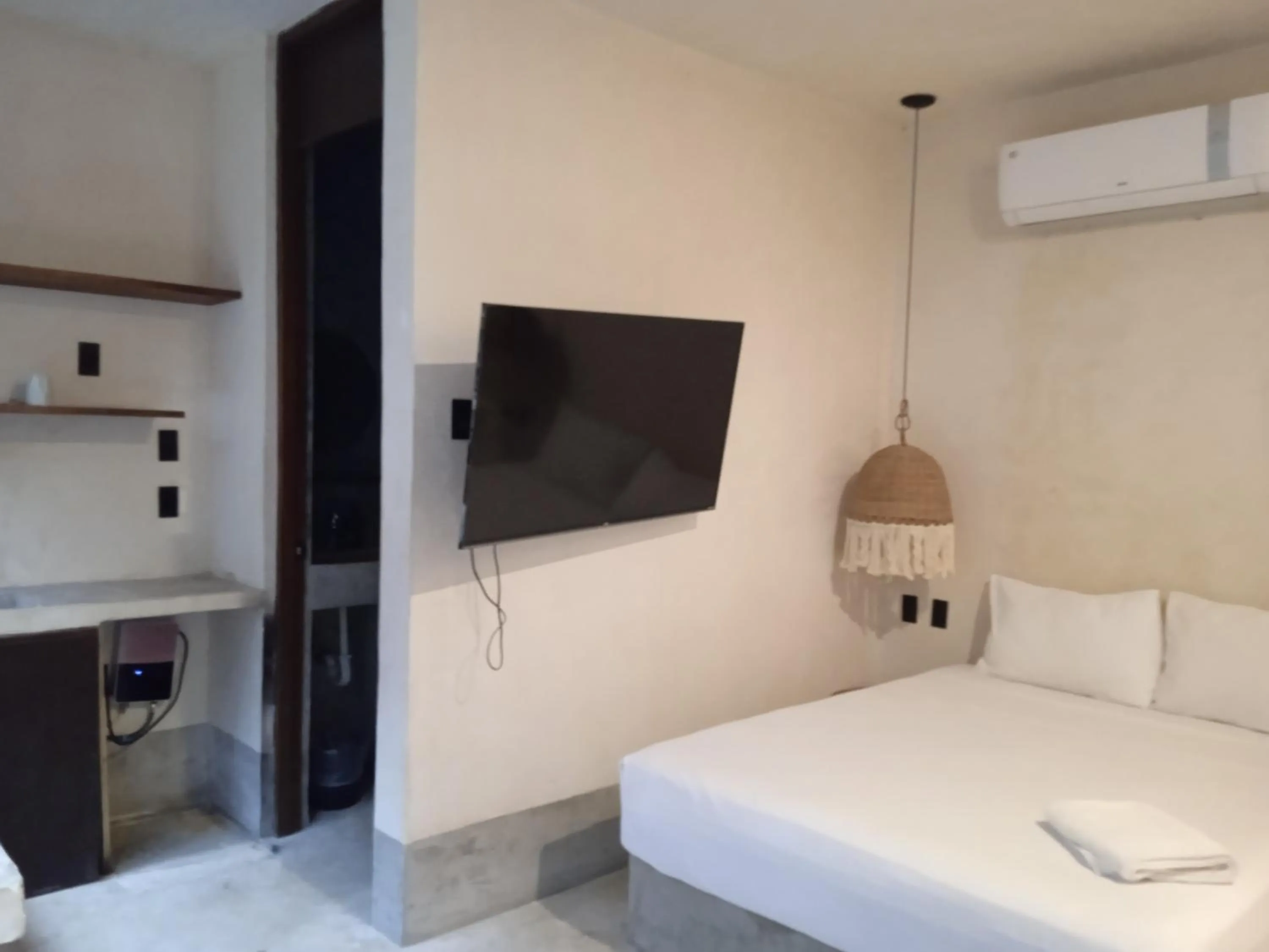TV and multimedia, Bed in Nuee Hotel & Beach Club