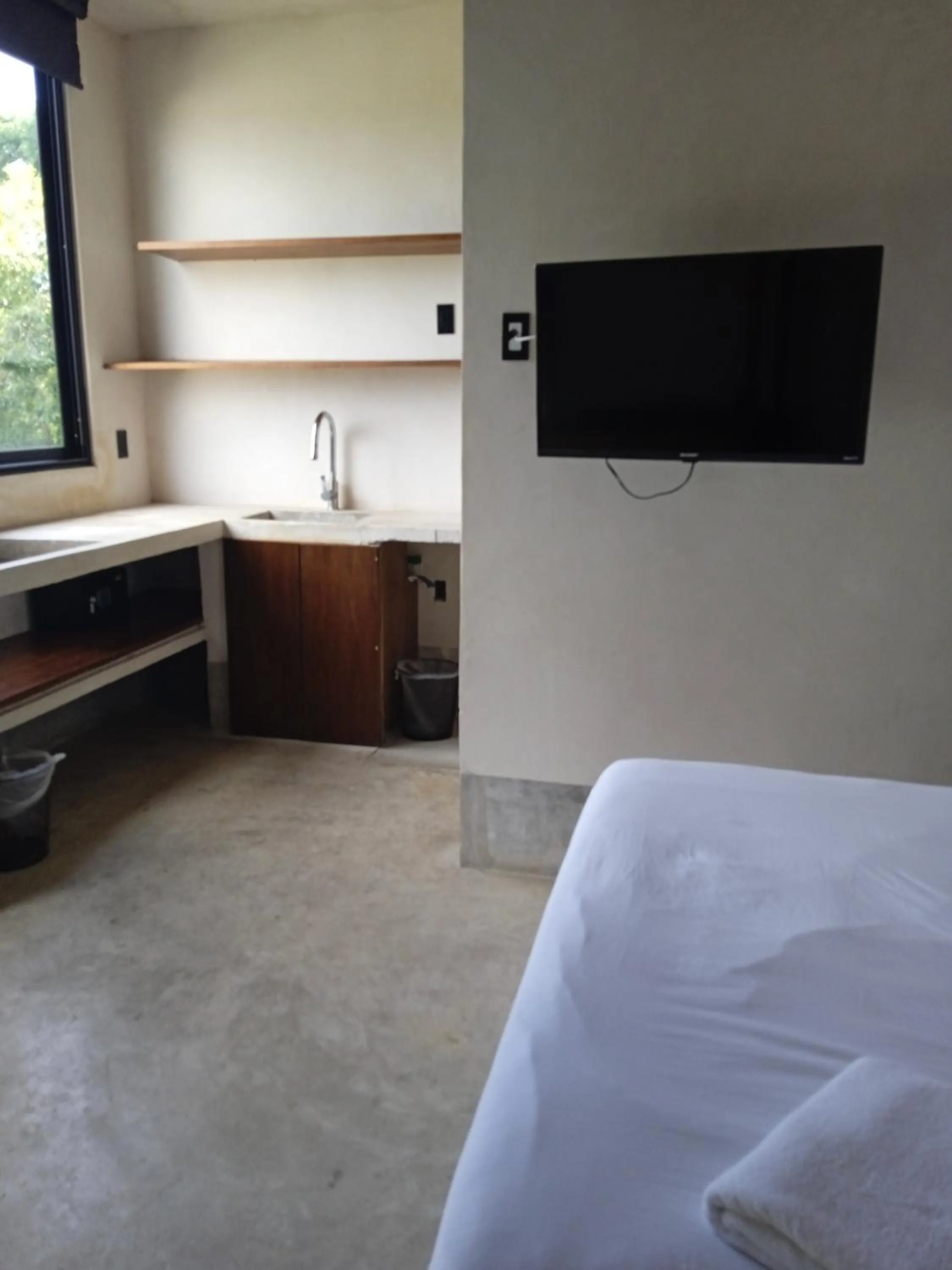 TV and multimedia, Bed in Nuee Hotel & Beach Club