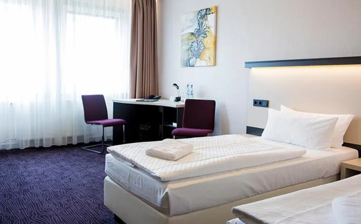 Bed in Dietrich-Bonhoeffer-Hotel Berlin Mitte