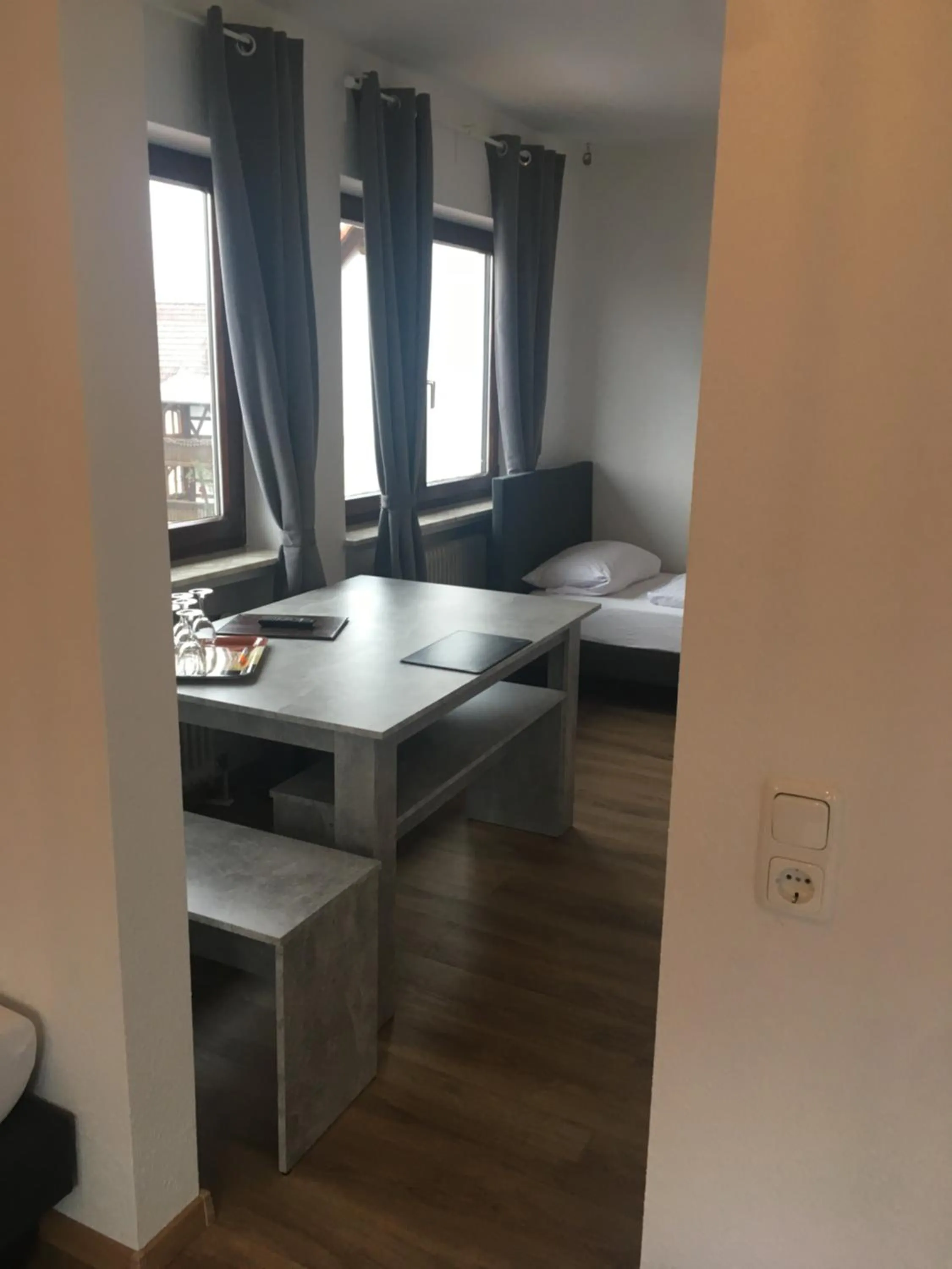 Living room, Bed in Hotel & Restaurant Zum Ochsen -Ox Distillery