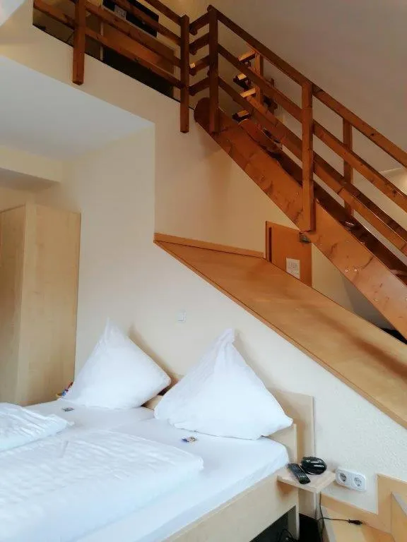 Photo of the whole room, Bed in Landgasthof Niebler