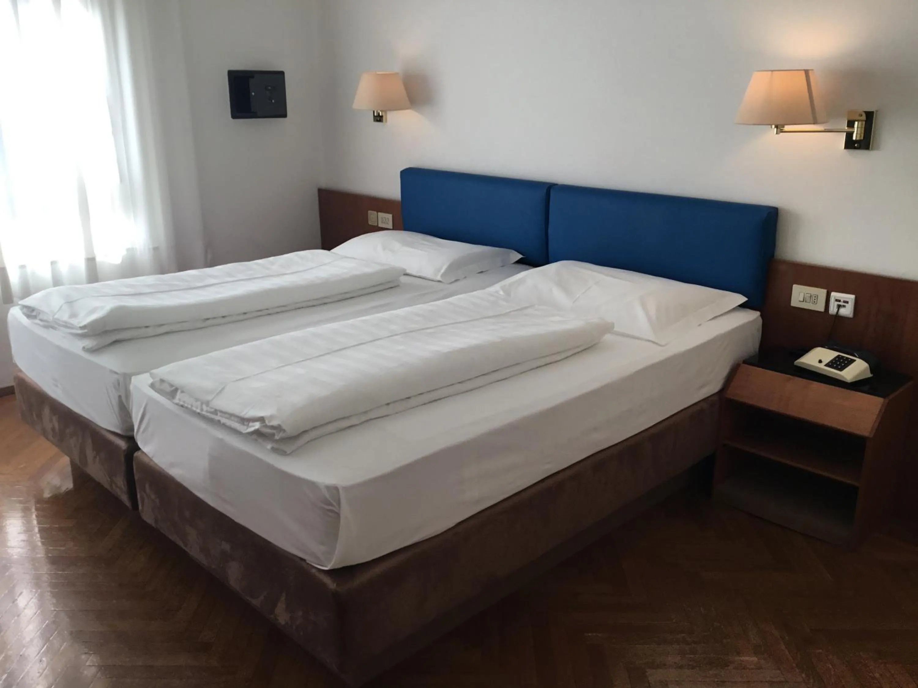 Bed in Hotel Adria