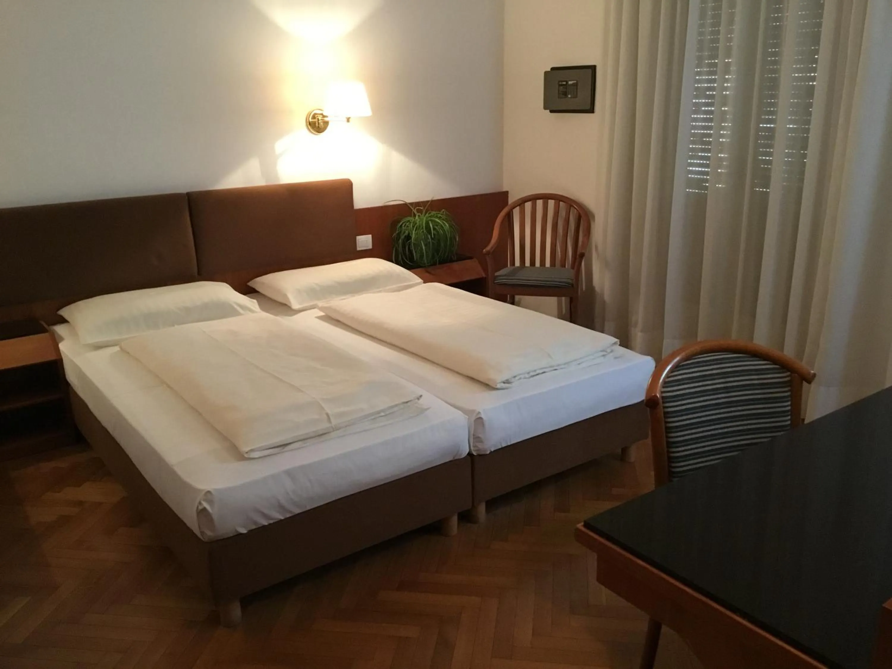 Bed in Hotel Adria