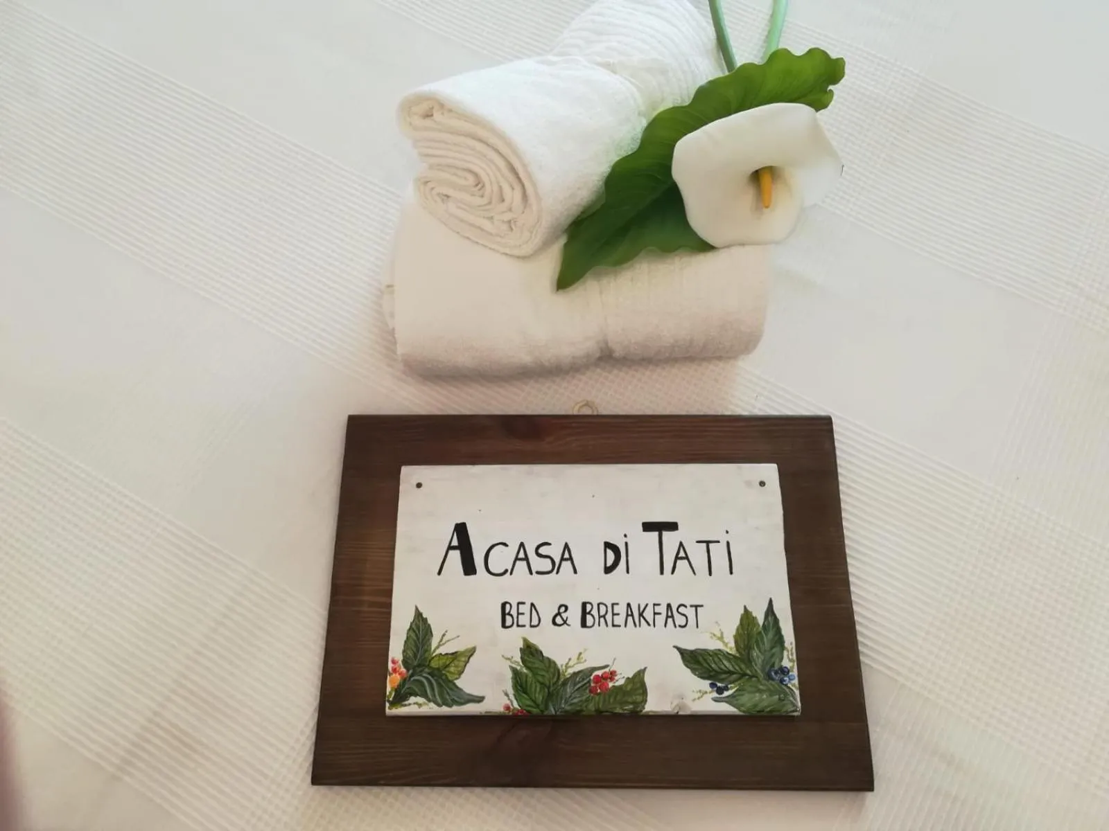 Property logo or sign in A CASA DI TATI