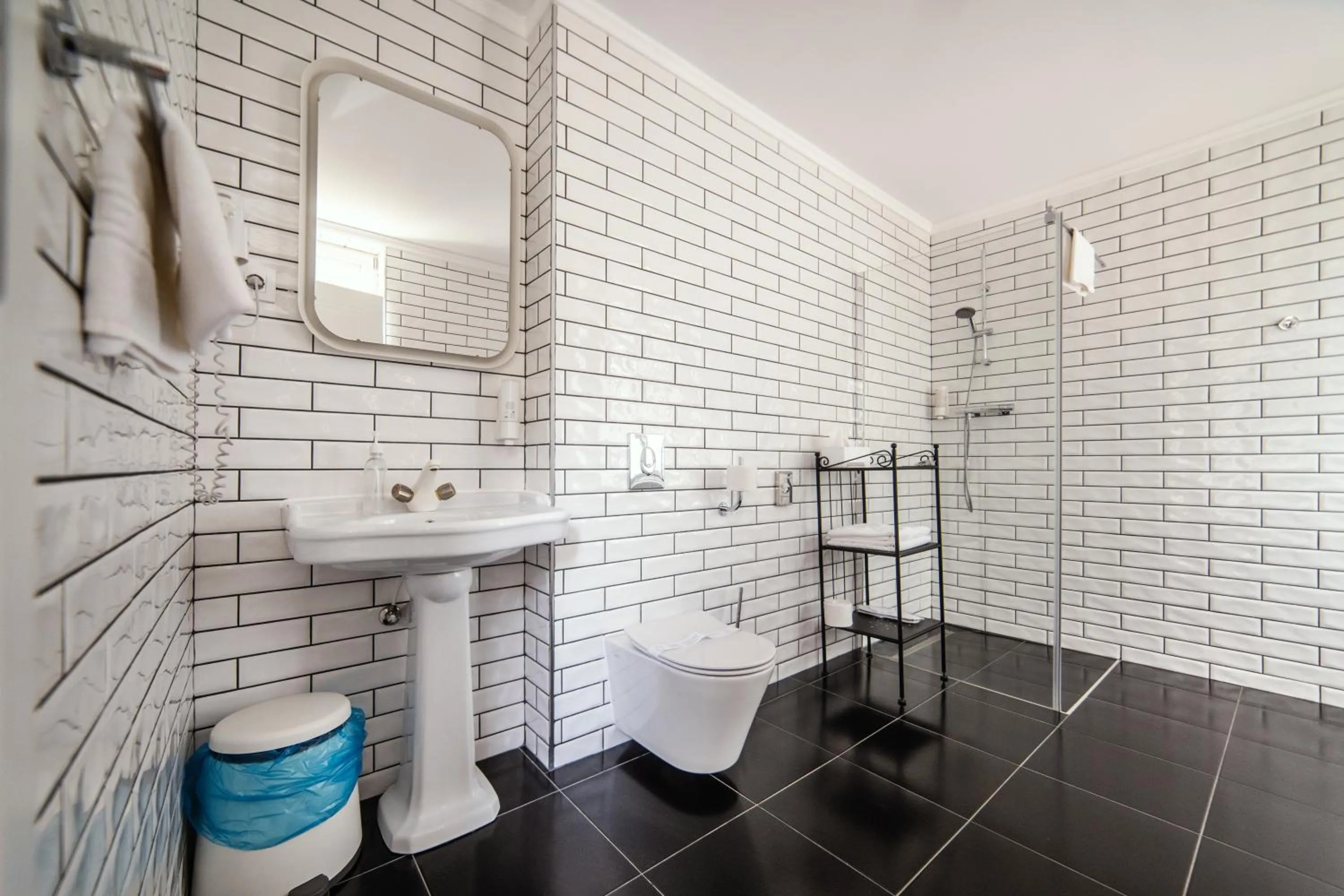 Bathroom in compleX living aparthotel