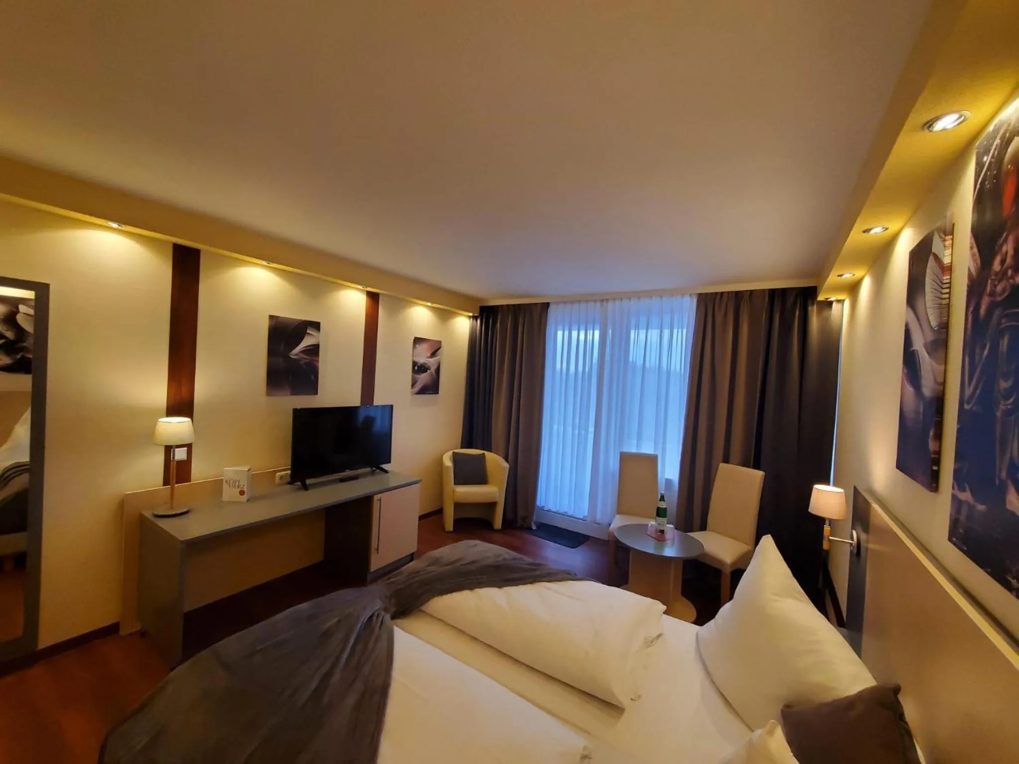 Photo of the whole room, Bed in CAREA Residenz Hotel Harzhöhe