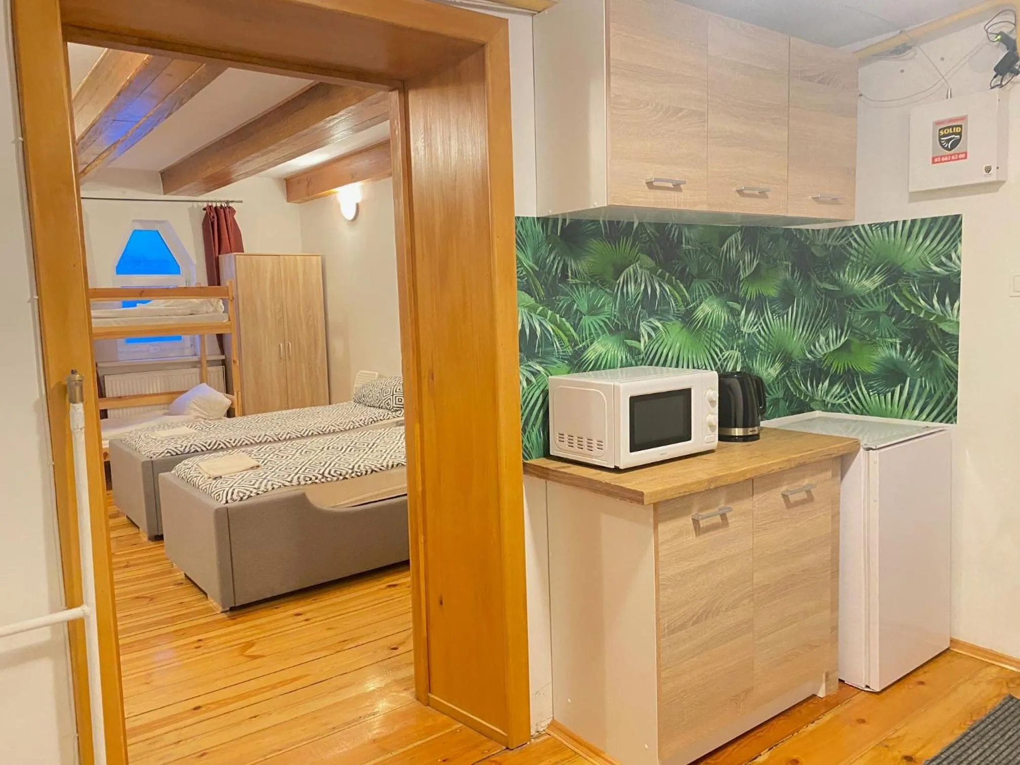 Kitchen or kitchenette, Bed in Hostel Białystok Centrum