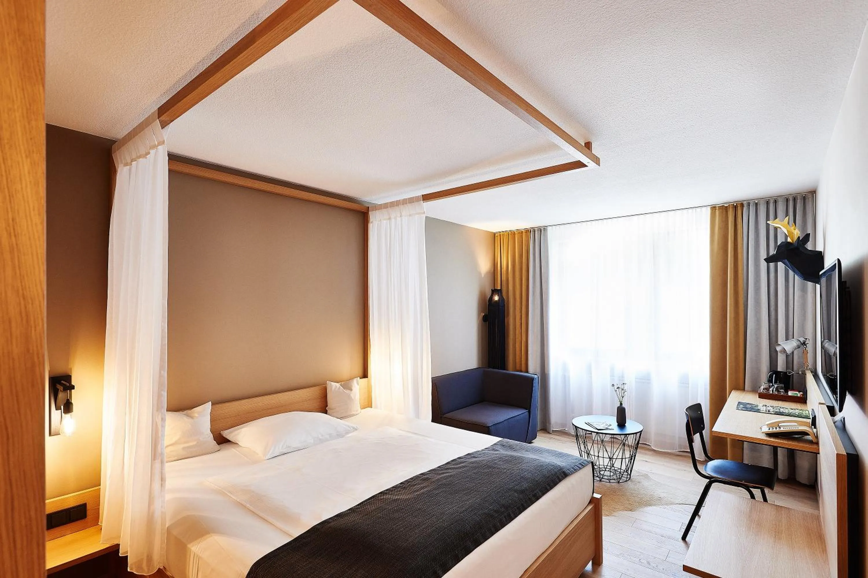 Photo of the whole room, Bed in Hotel Zugbrücke Grenzau GmbH