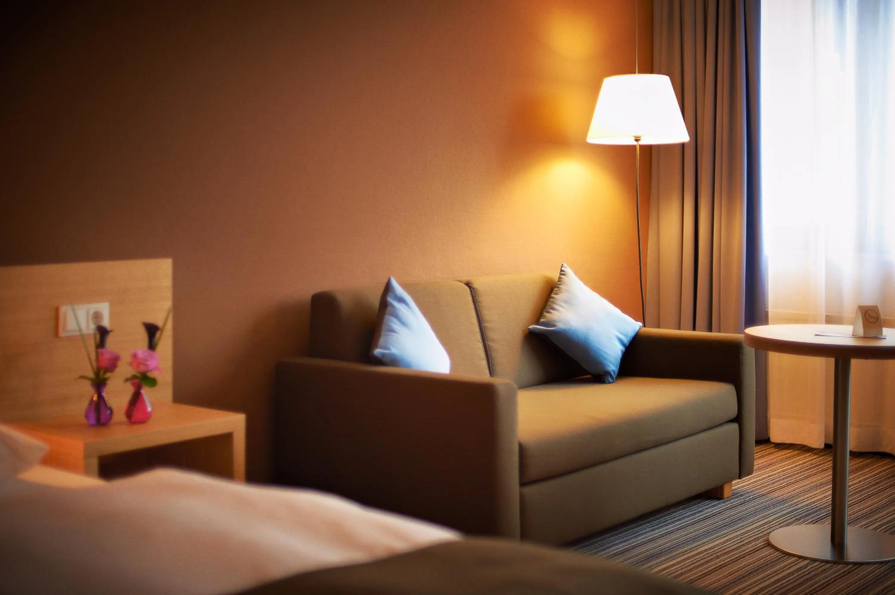 Seating area, Bed in Hotel Zugbrücke Grenzau GmbH