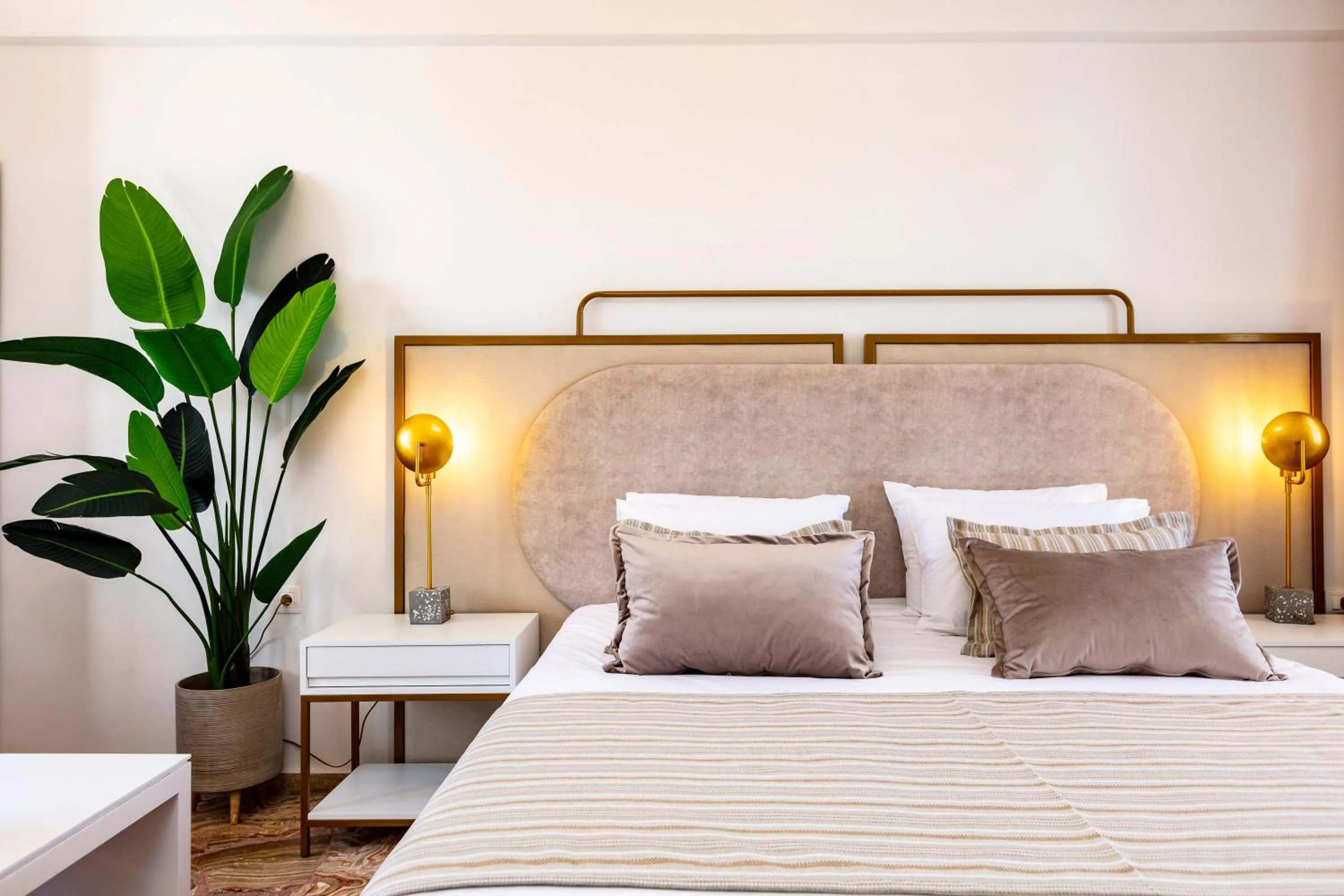 Bed in Pinelopi Beach Suites