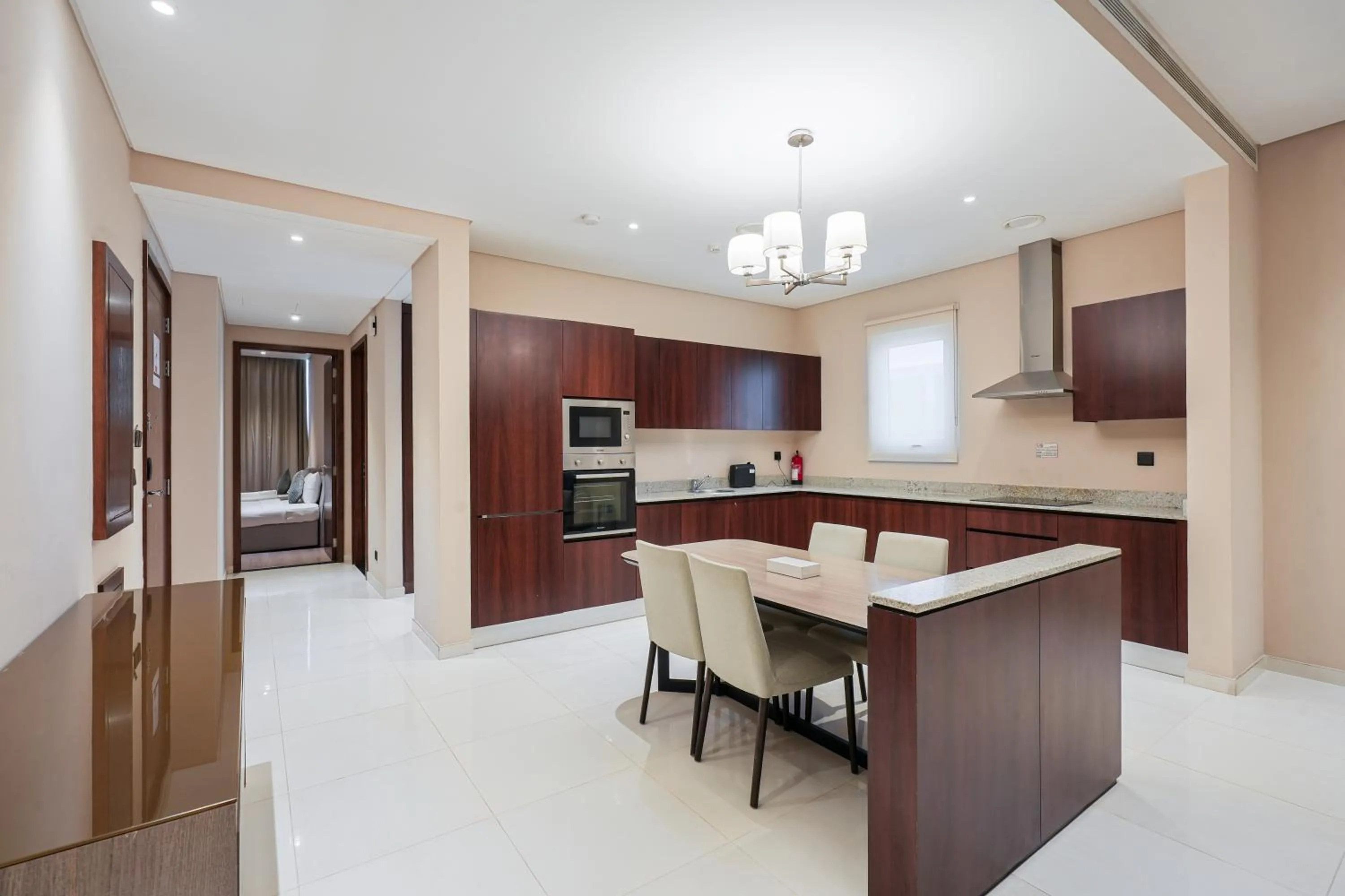 Kitchen or kitchenette in Eden Garden Hotel Apartment