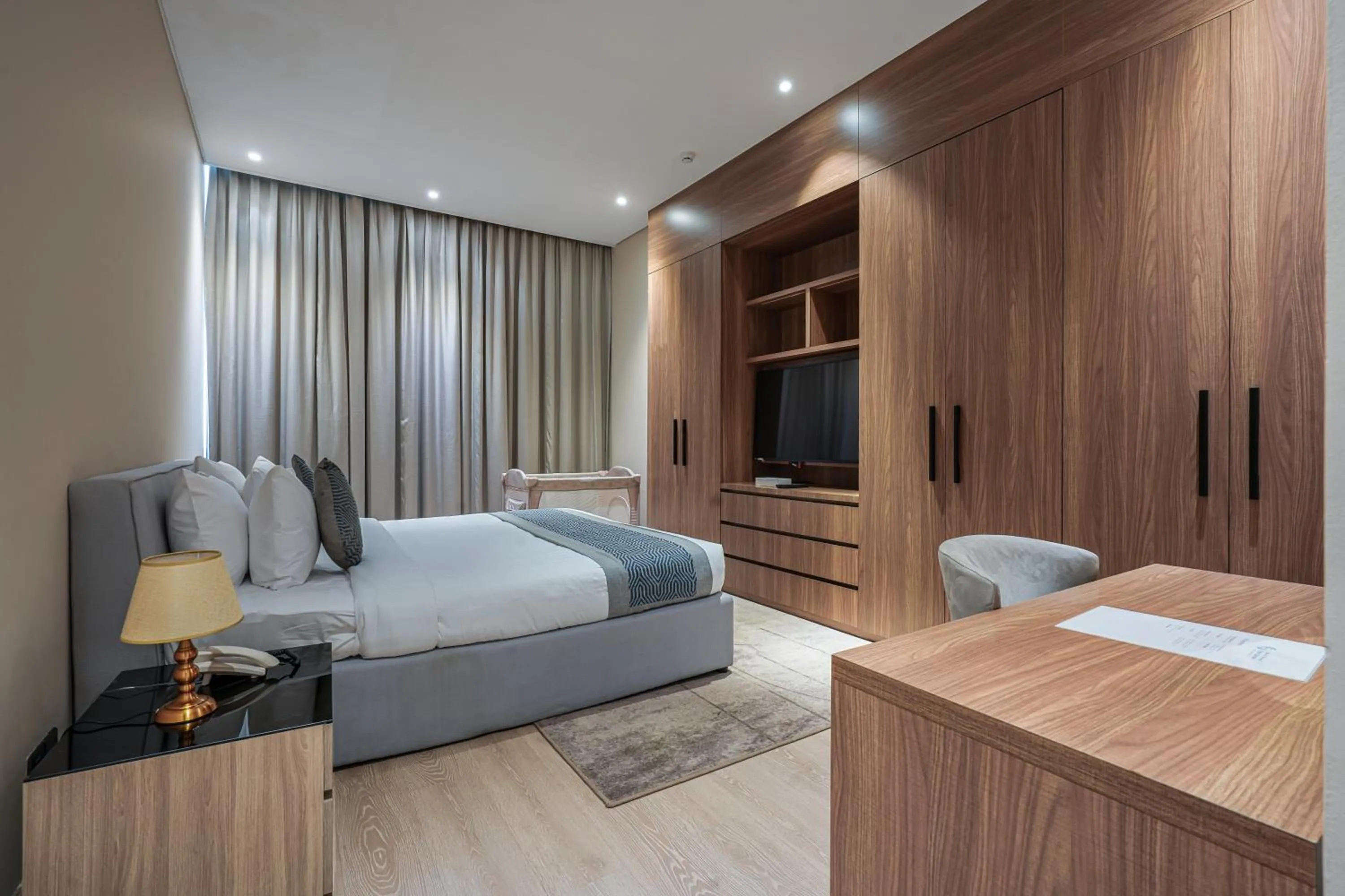 Bed in Eden Garden Hotel Apartment