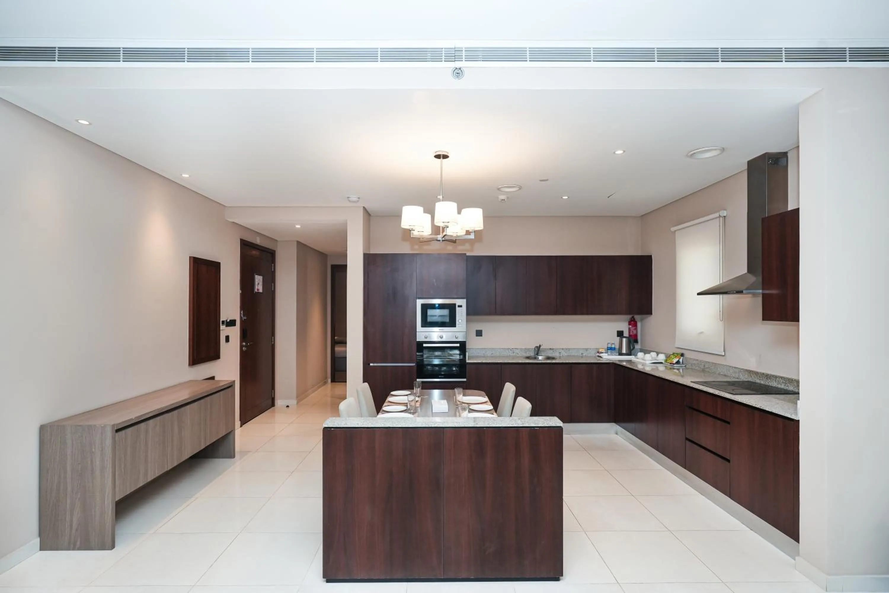 Kitchen or kitchenette in Eden Garden Hotel Apartment