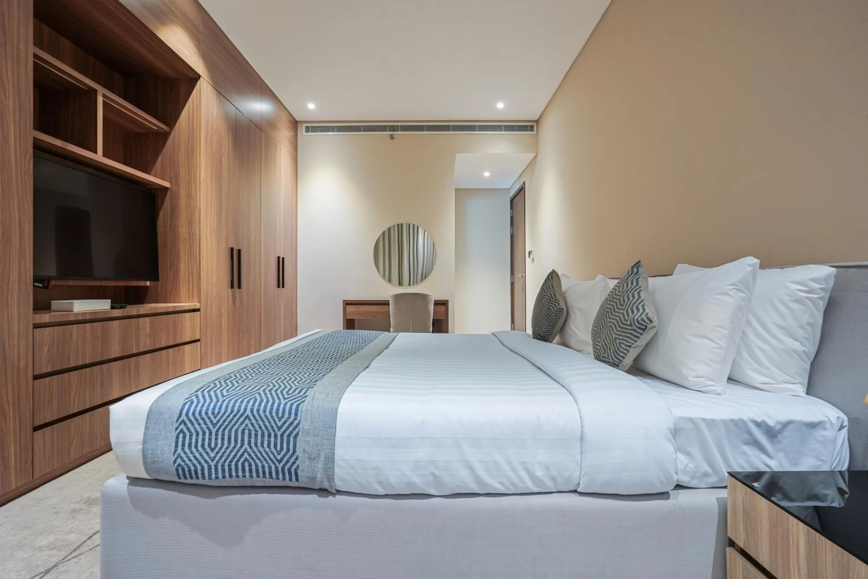 Bed in Eden Garden Hotel Apartment