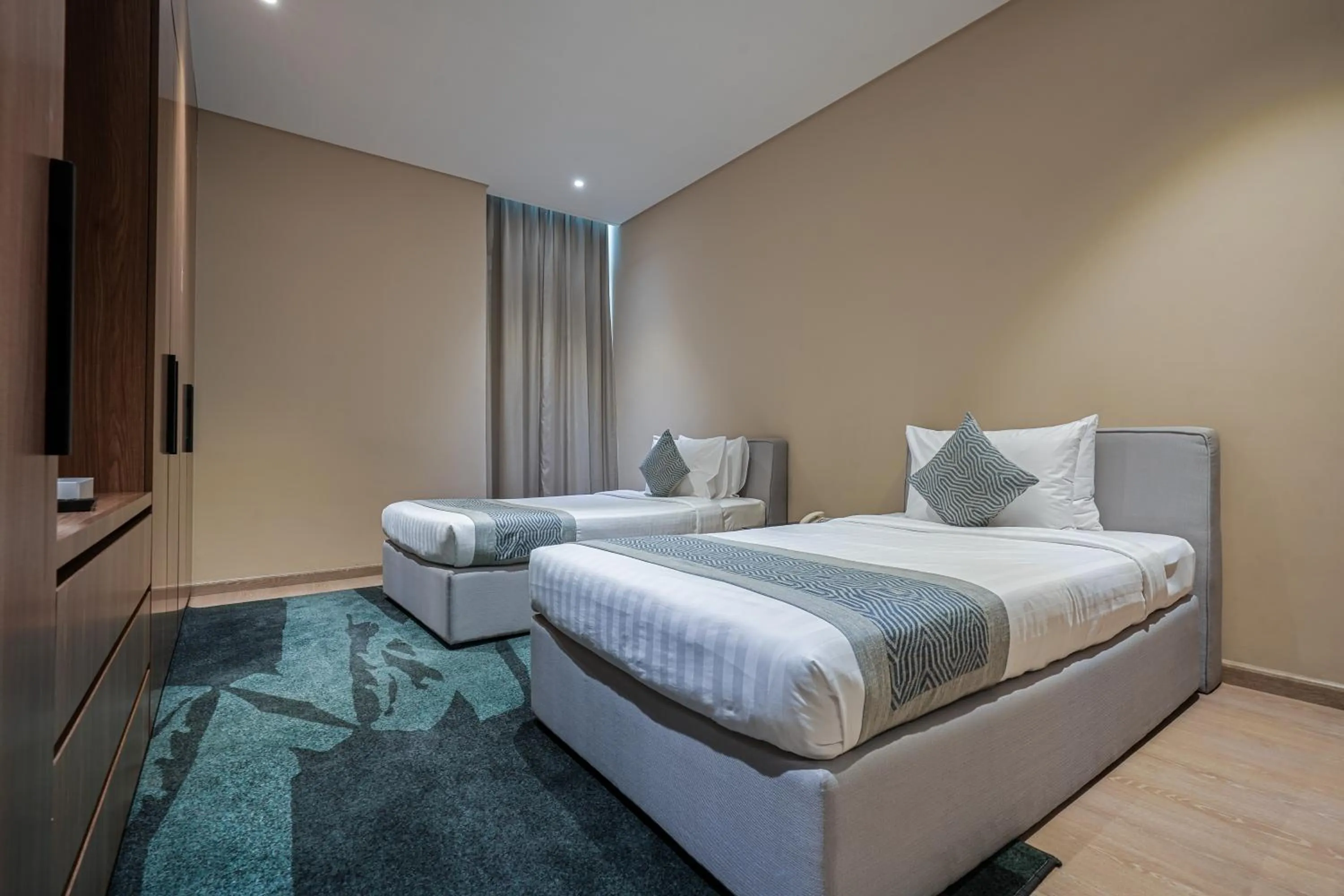 Bed in Eden Garden Hotel Apartment