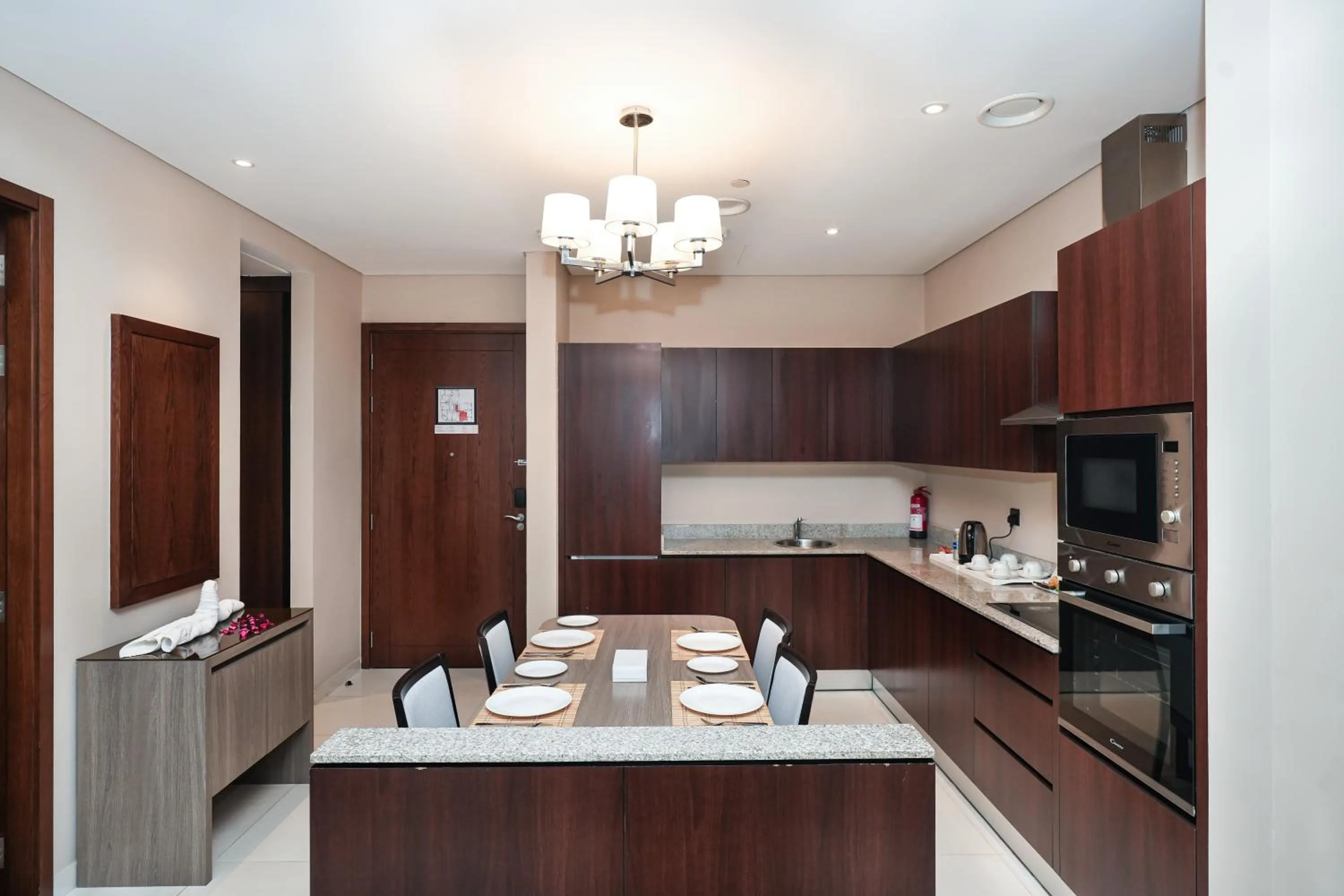 Kitchen or kitchenette in Eden Garden Hotel Apartment