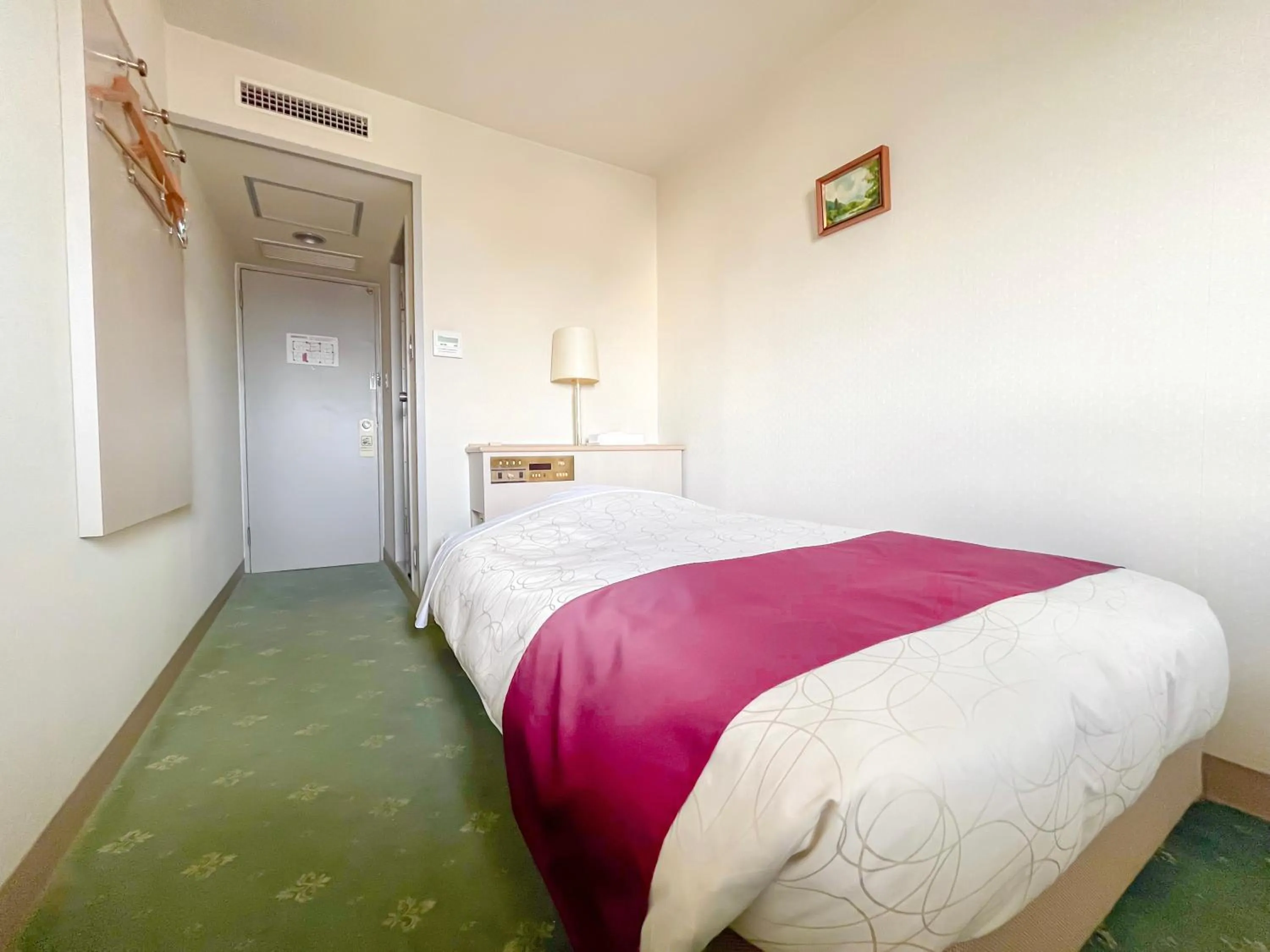 Bed in Hachinohe Plaza Hotel