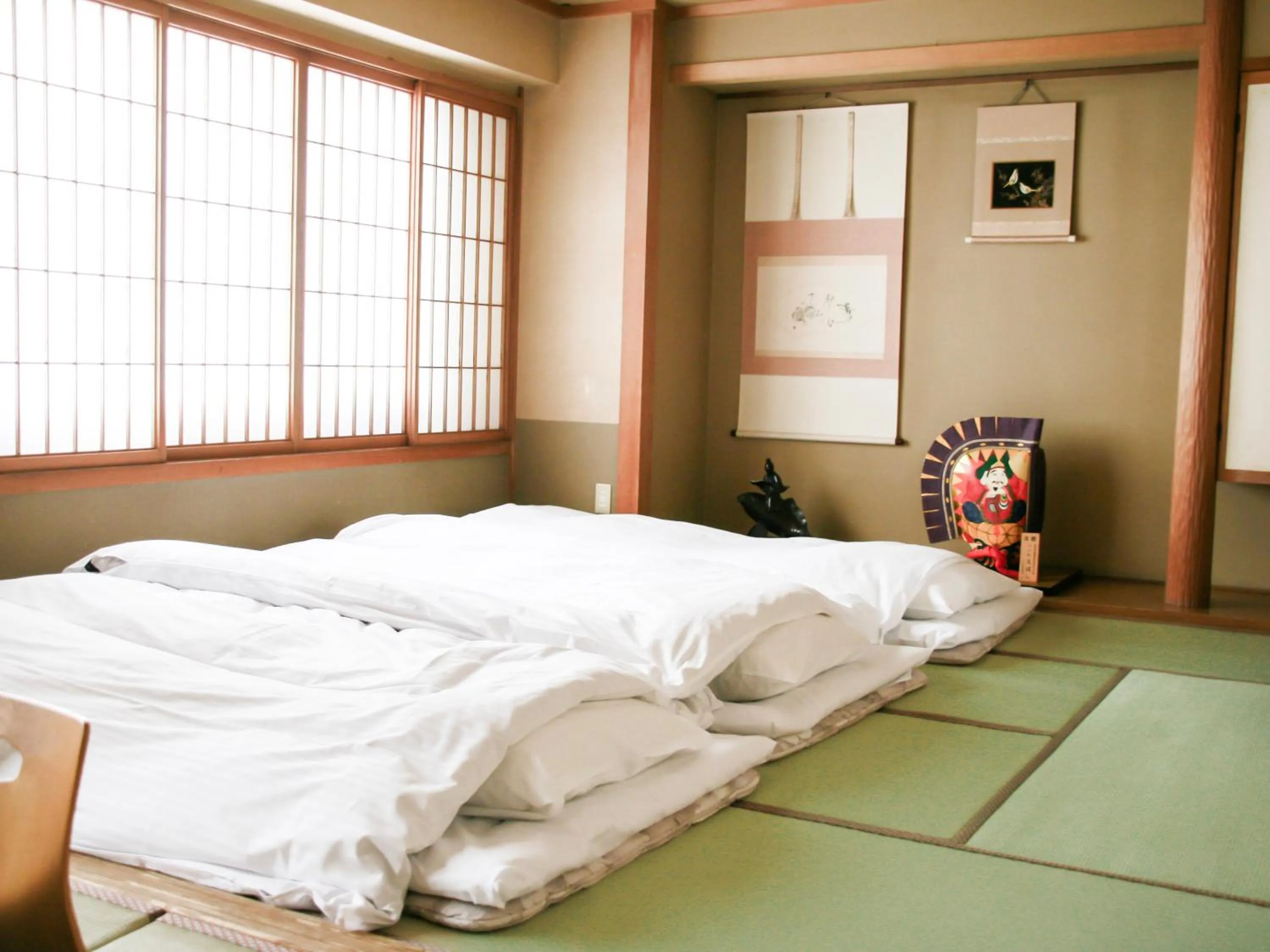 Bed in Hachinohe Plaza Hotel
