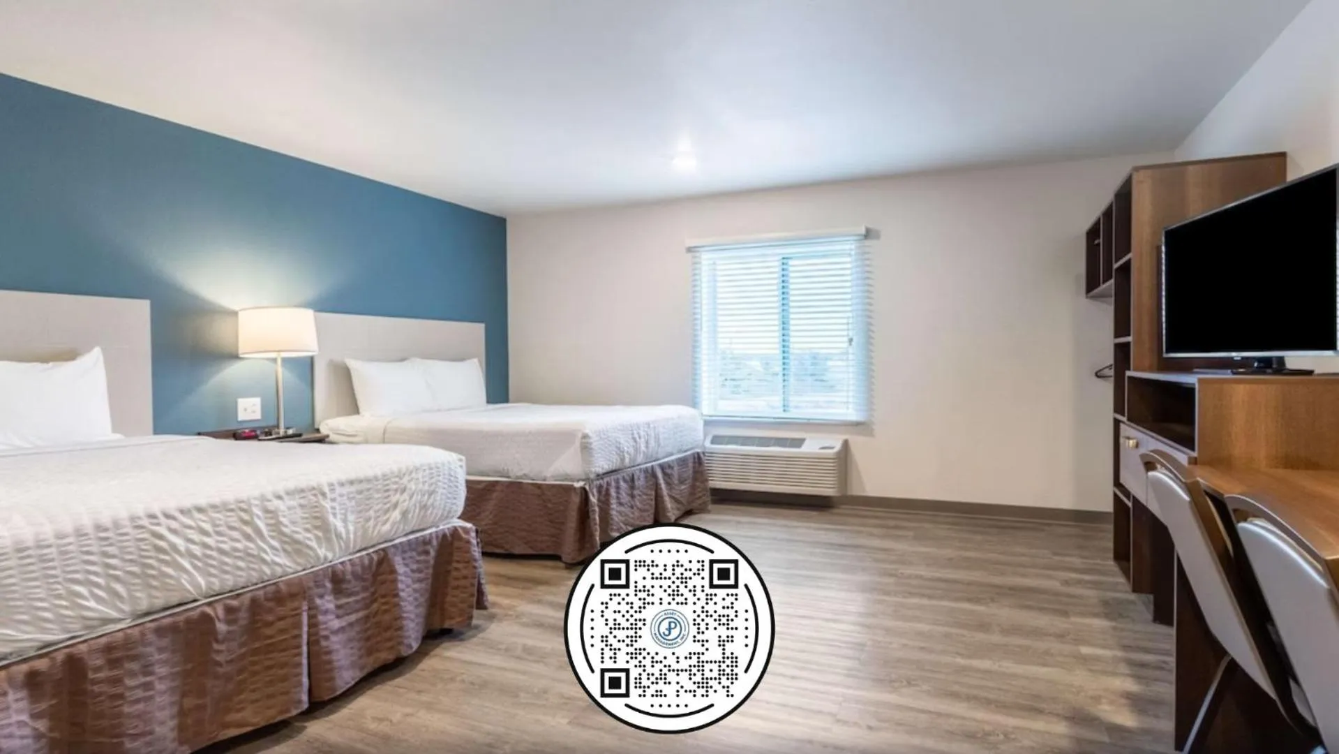 Bed in WoodSpring Suites Indianapolis Castleton