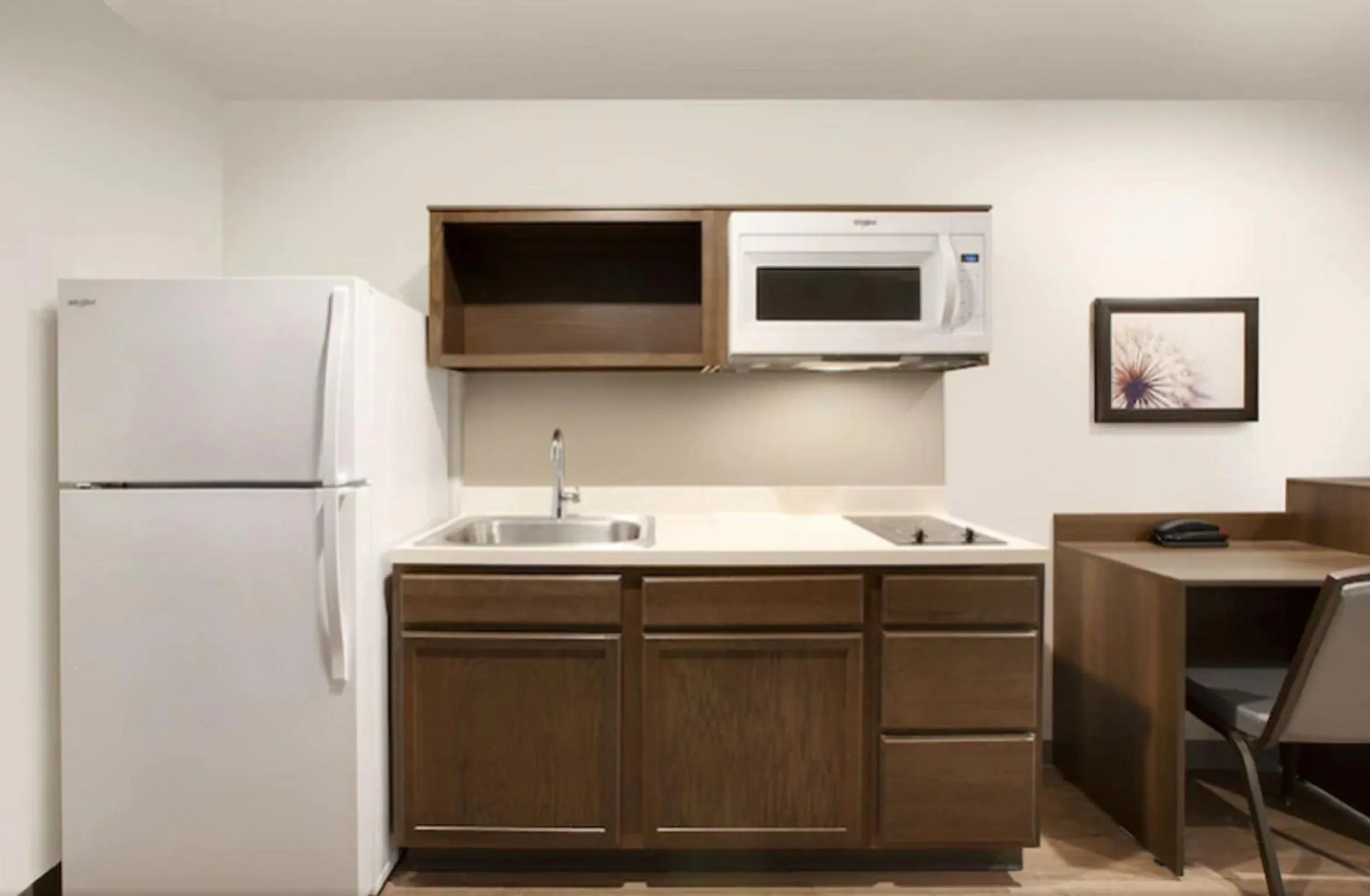 Kitchen or kitchenette in Woodspring Suites Atlanta Stockbridge