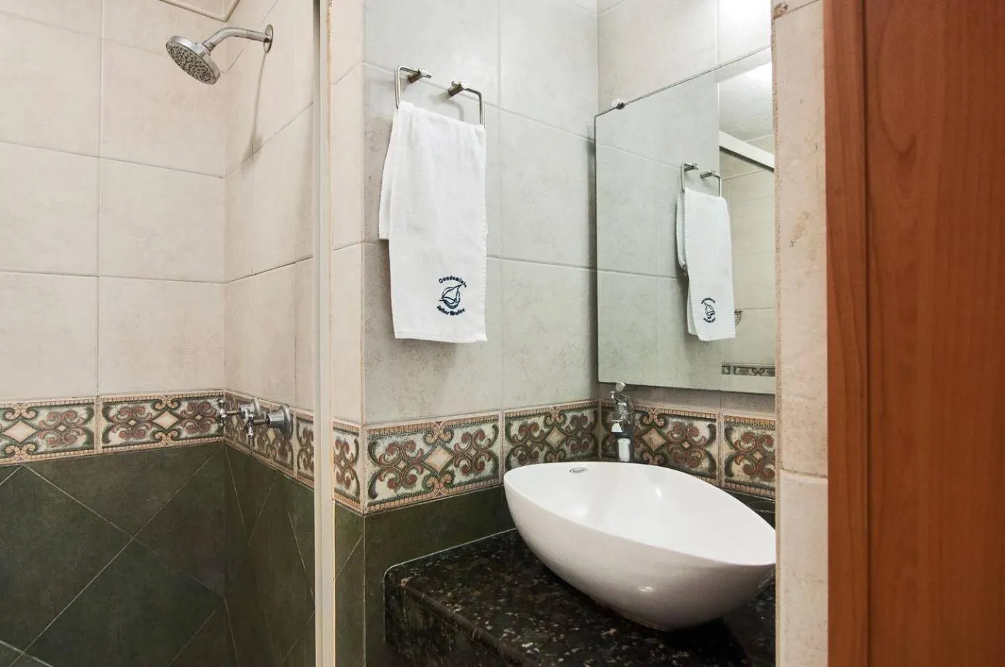 Shower in Marina Suites by Andiani Travel