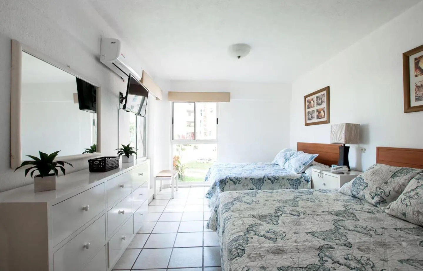 Bed in Marina Suites by Andiani Travel