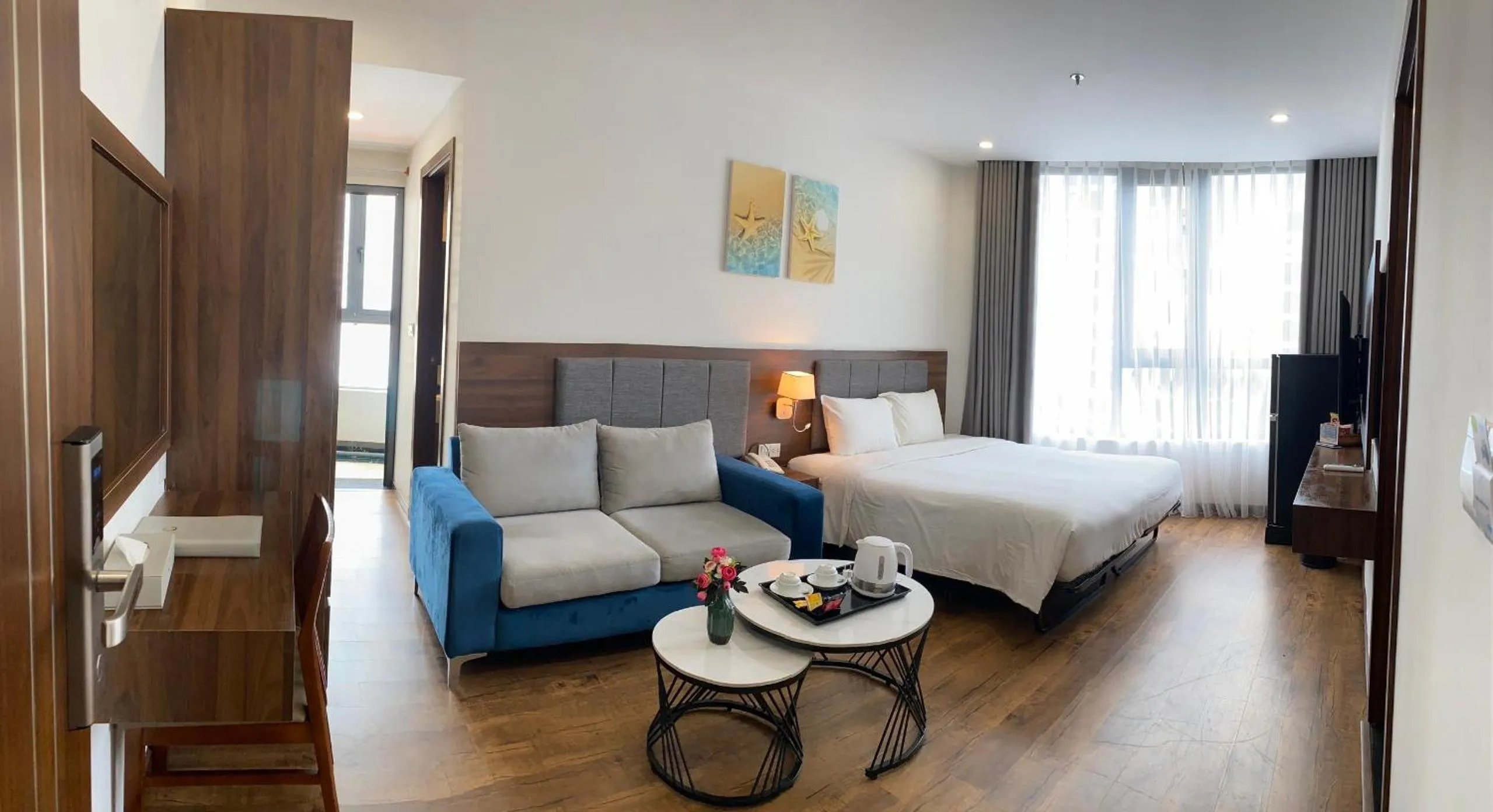 Living room, Bed in Capecia Danang Hotel and Apartment