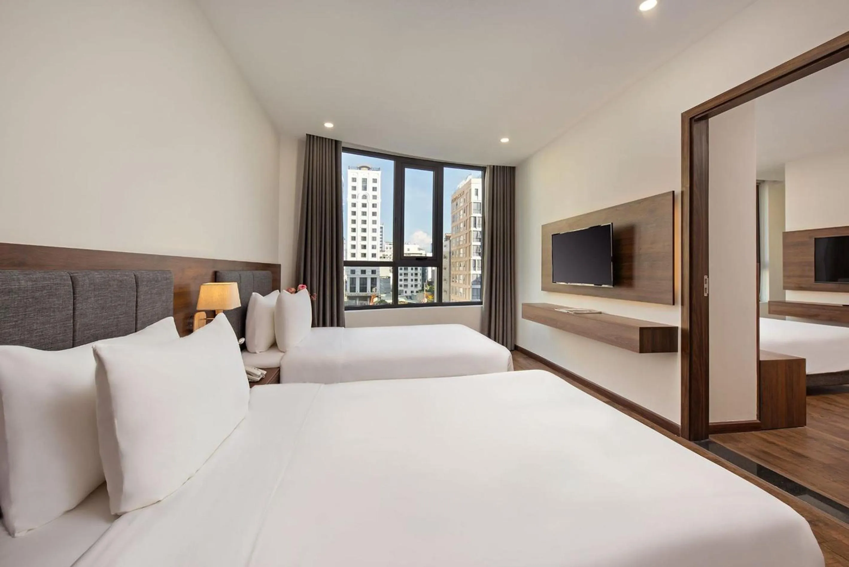 Photo of the whole room, Bed in Capecia Danang Hotel and Apartment