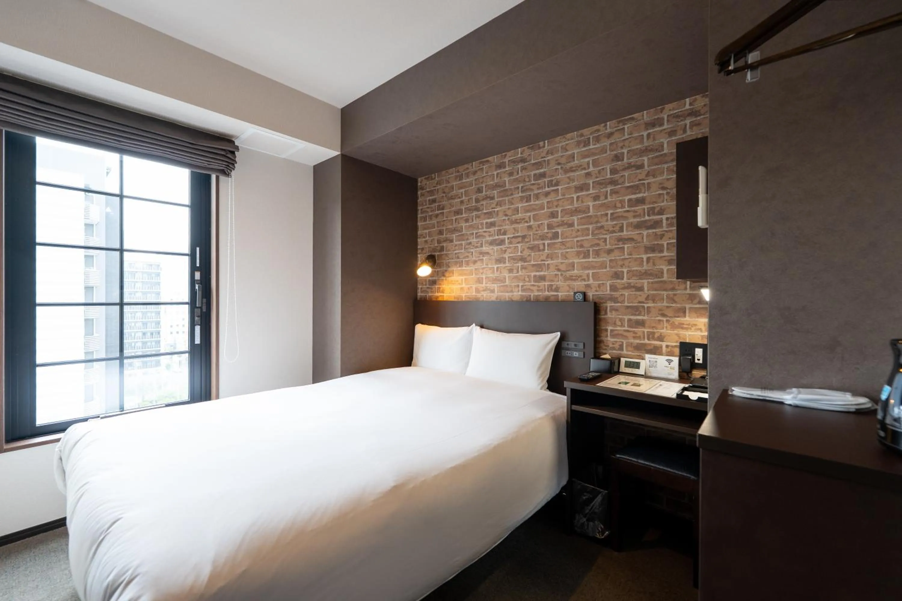 Bed in HOTEL TABARD TOKYO