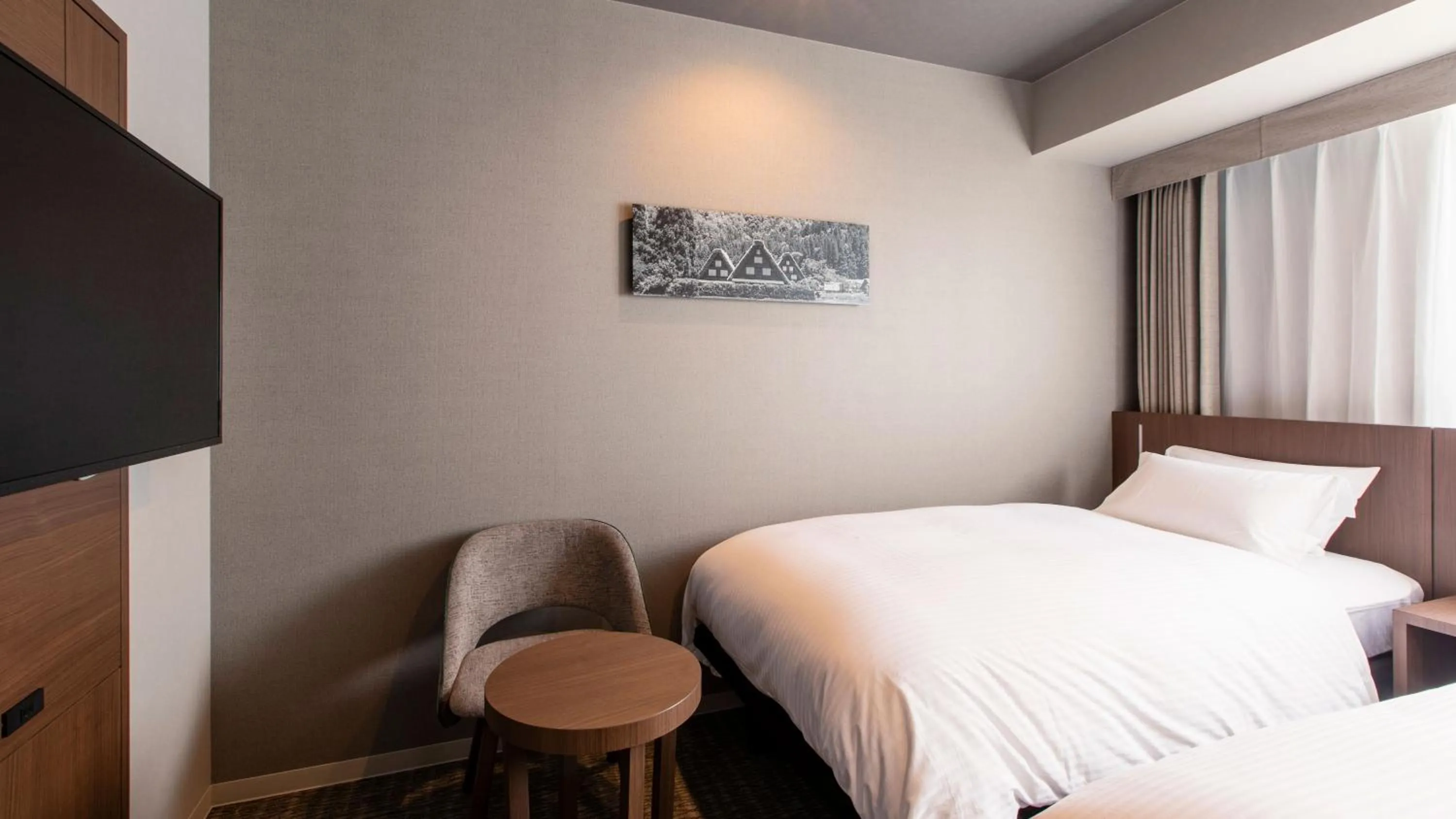 Photo of the whole room, Bed in KOKO HOTEL Hidatakayama - formaly Hotel Wing Hida Takayama