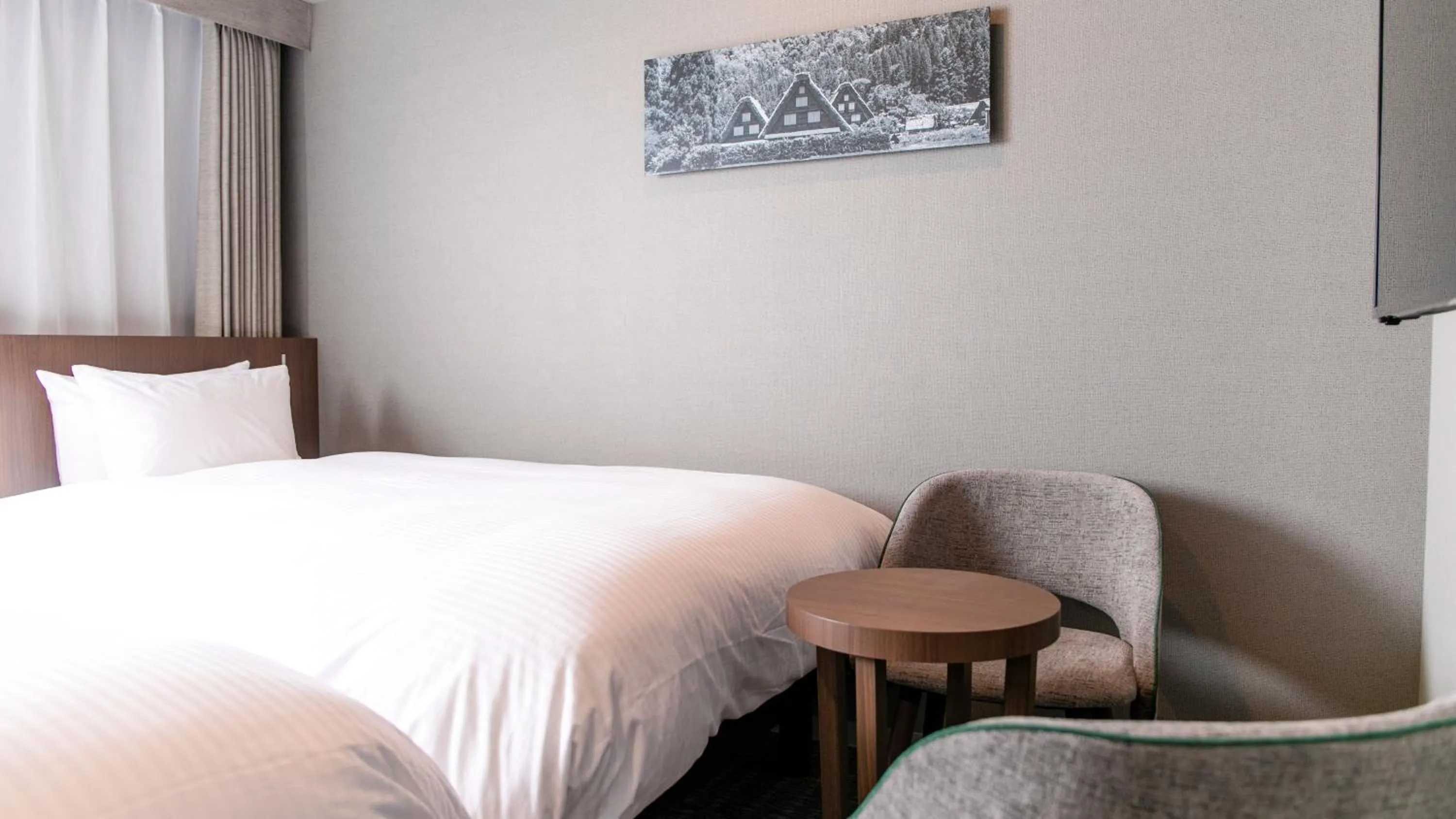 Photo of the whole room, Bed in KOKO HOTEL Hidatakayama - formaly Hotel Wing Hida Takayama