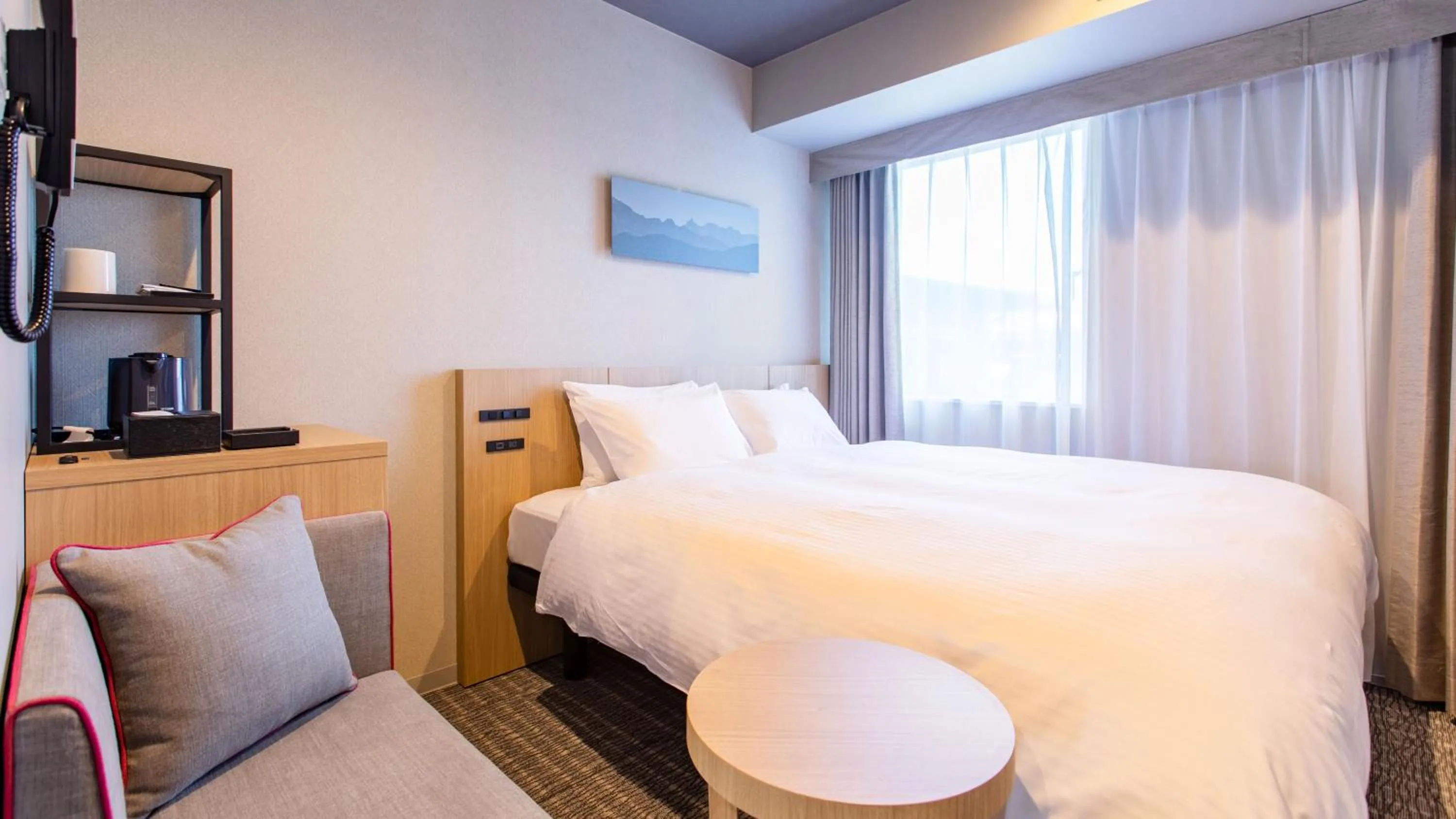 Photo of the whole room, Bed in KOKO HOTEL Hidatakayama - formaly Hotel Wing Hida Takayama