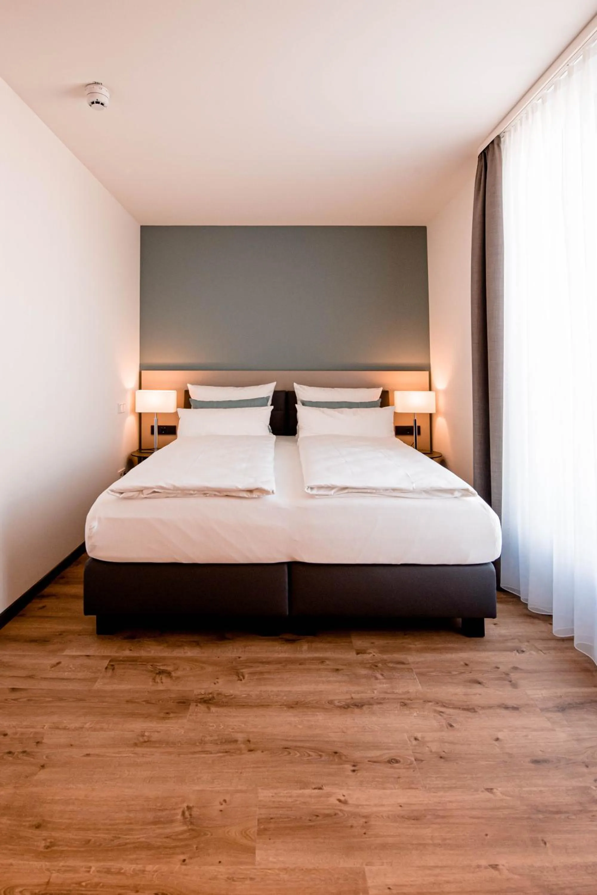 Bed in Zeitlos Boutiquehotel