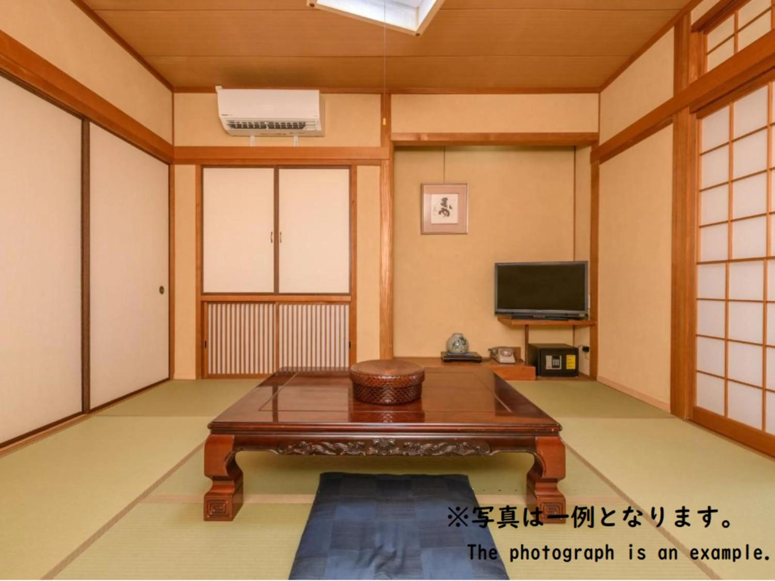 Communal lounge/ TV room in Tabist Asanokan Annex Iroha Ise