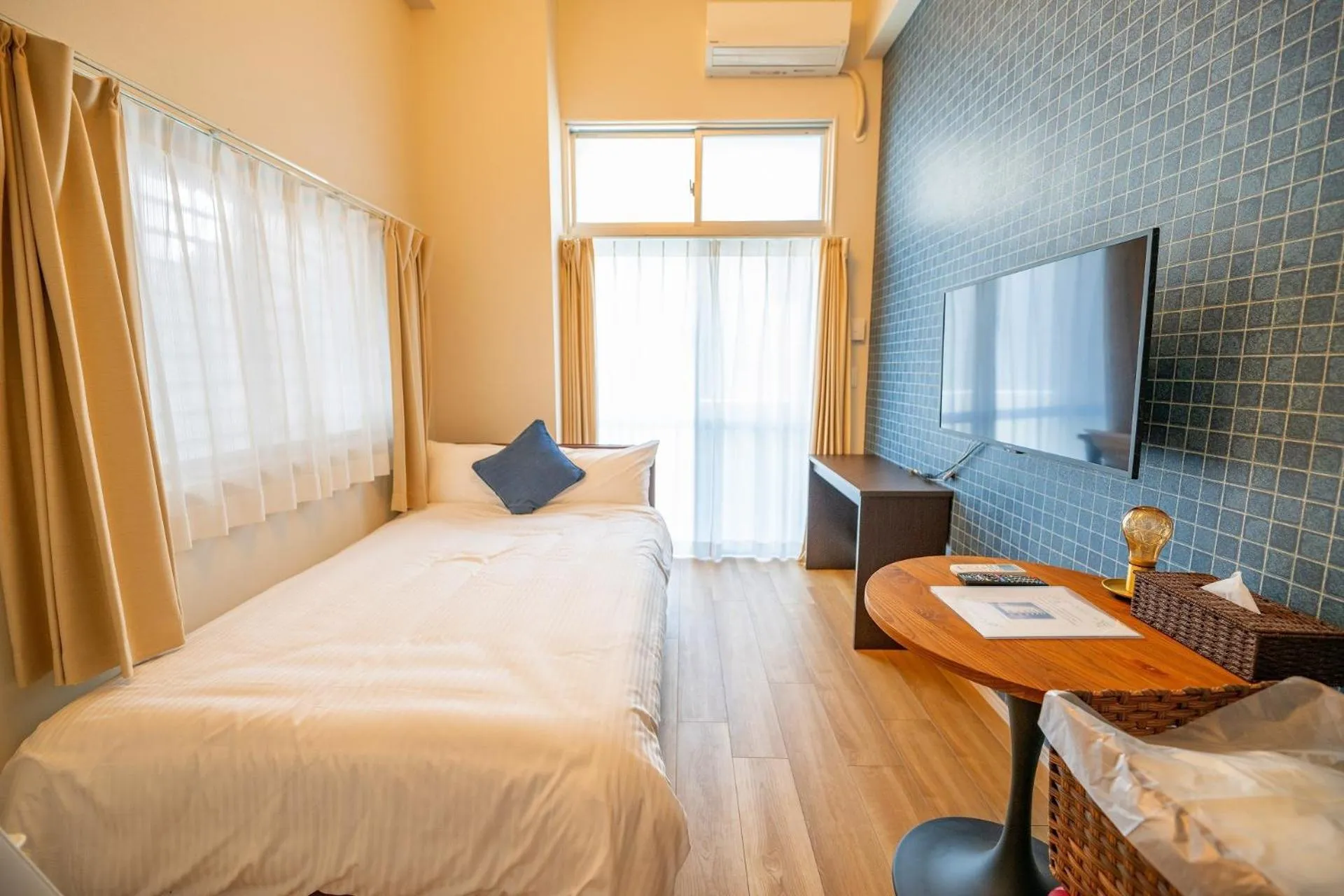 Bed in Hotel Tomas Asahibashi Station