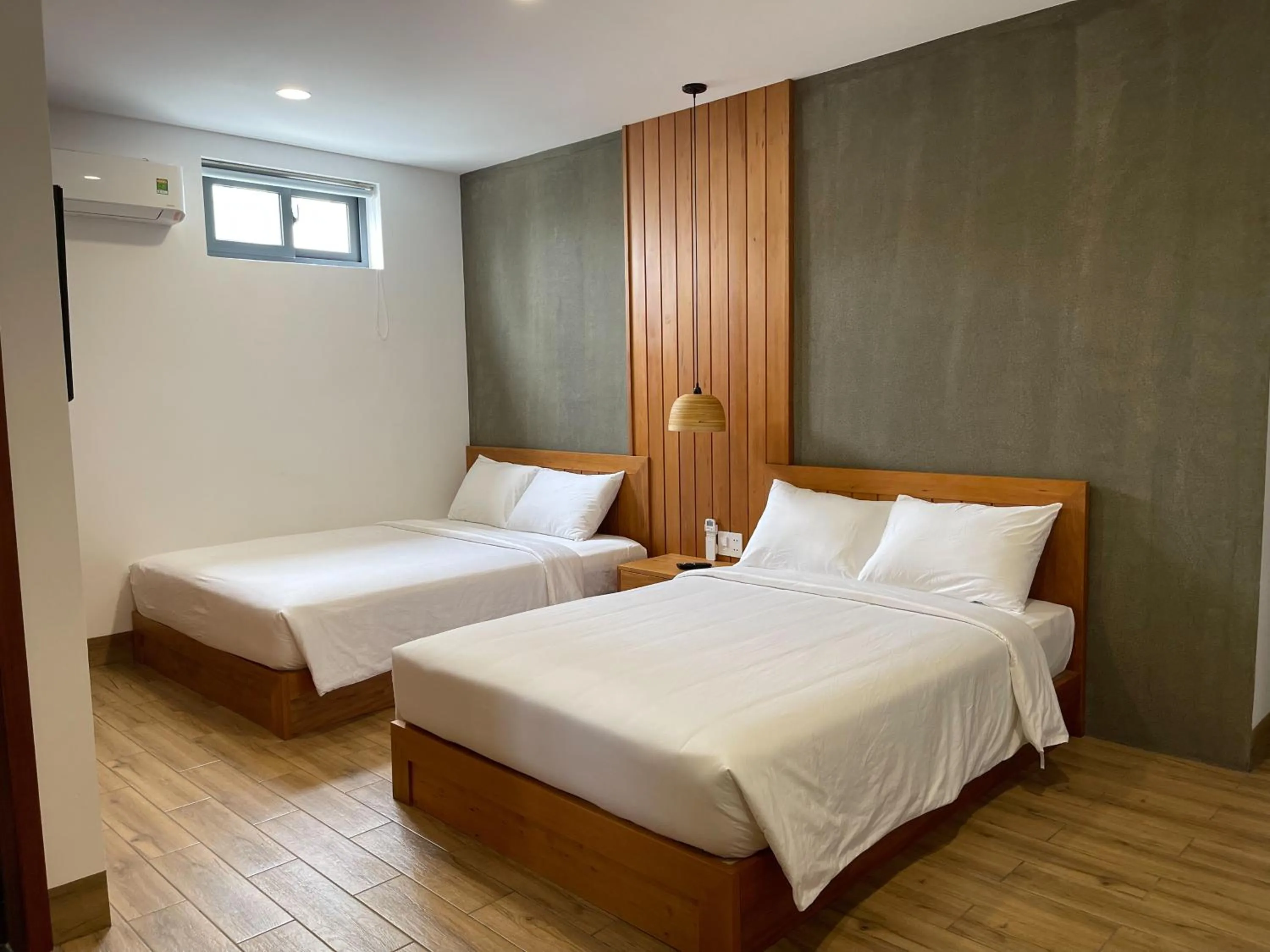 Bed in Coast House Boutique Hotel