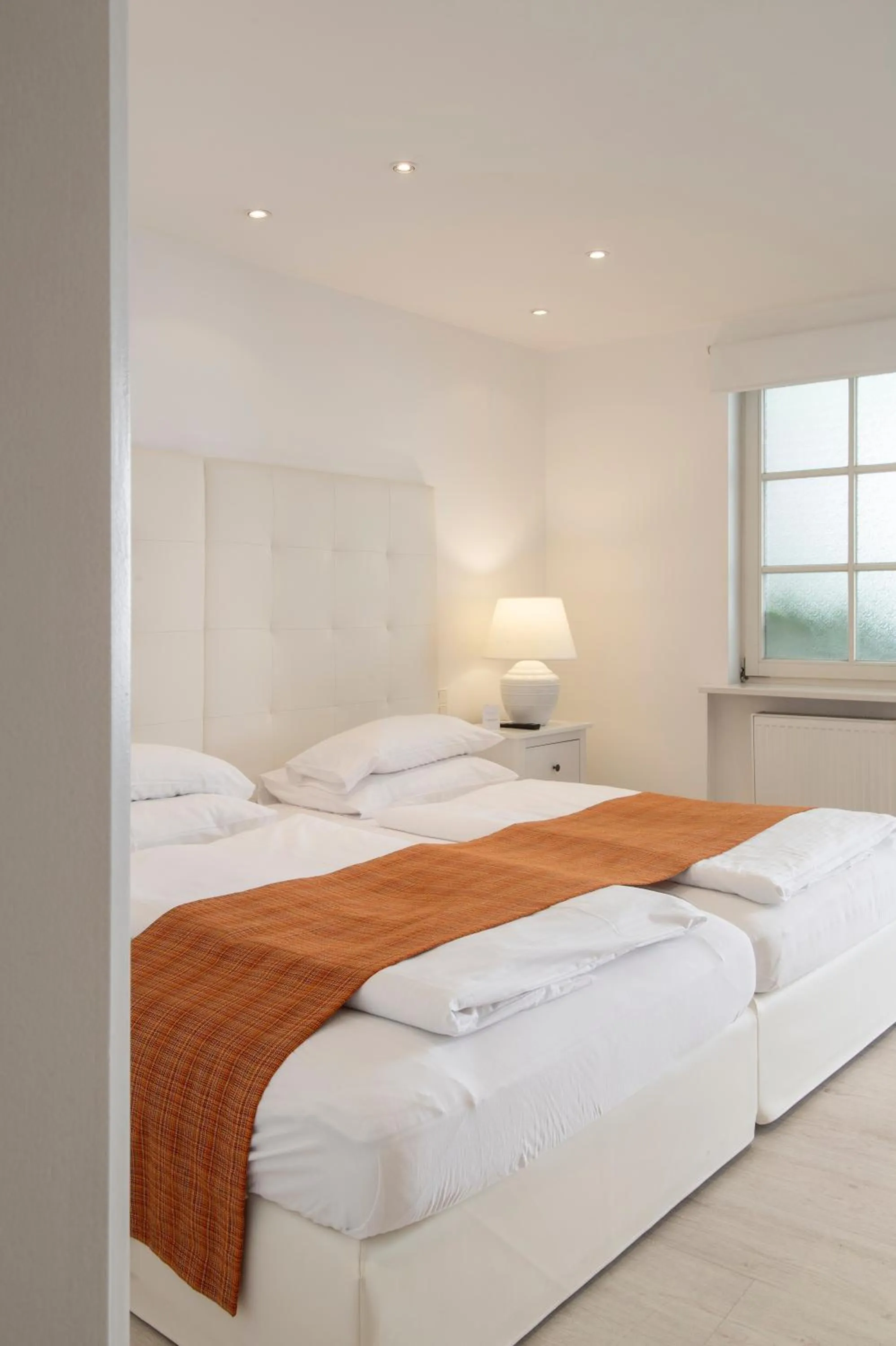 Bed in Werners Boutique Hotel