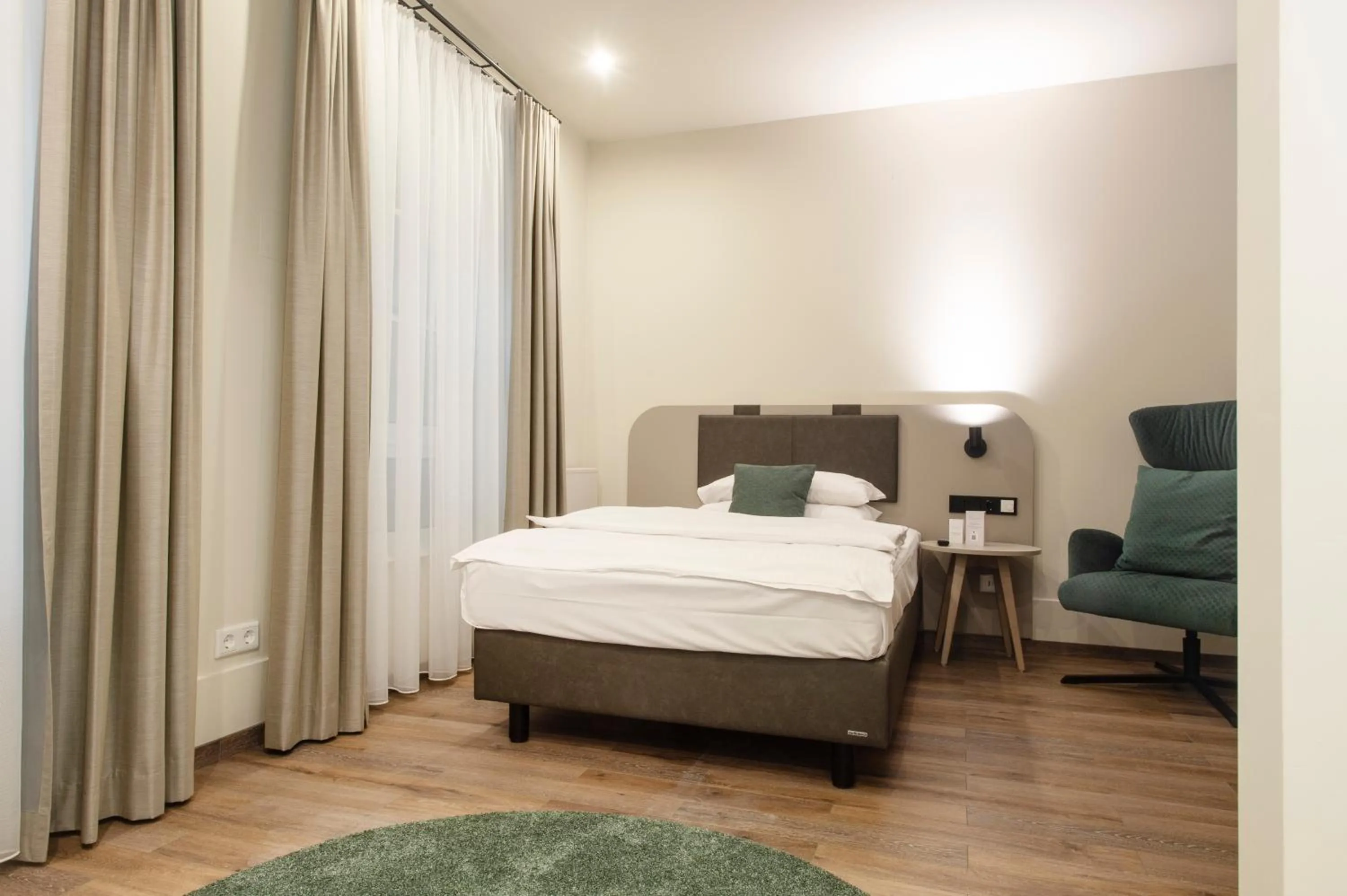 Bed in Werners Boutique Hotel