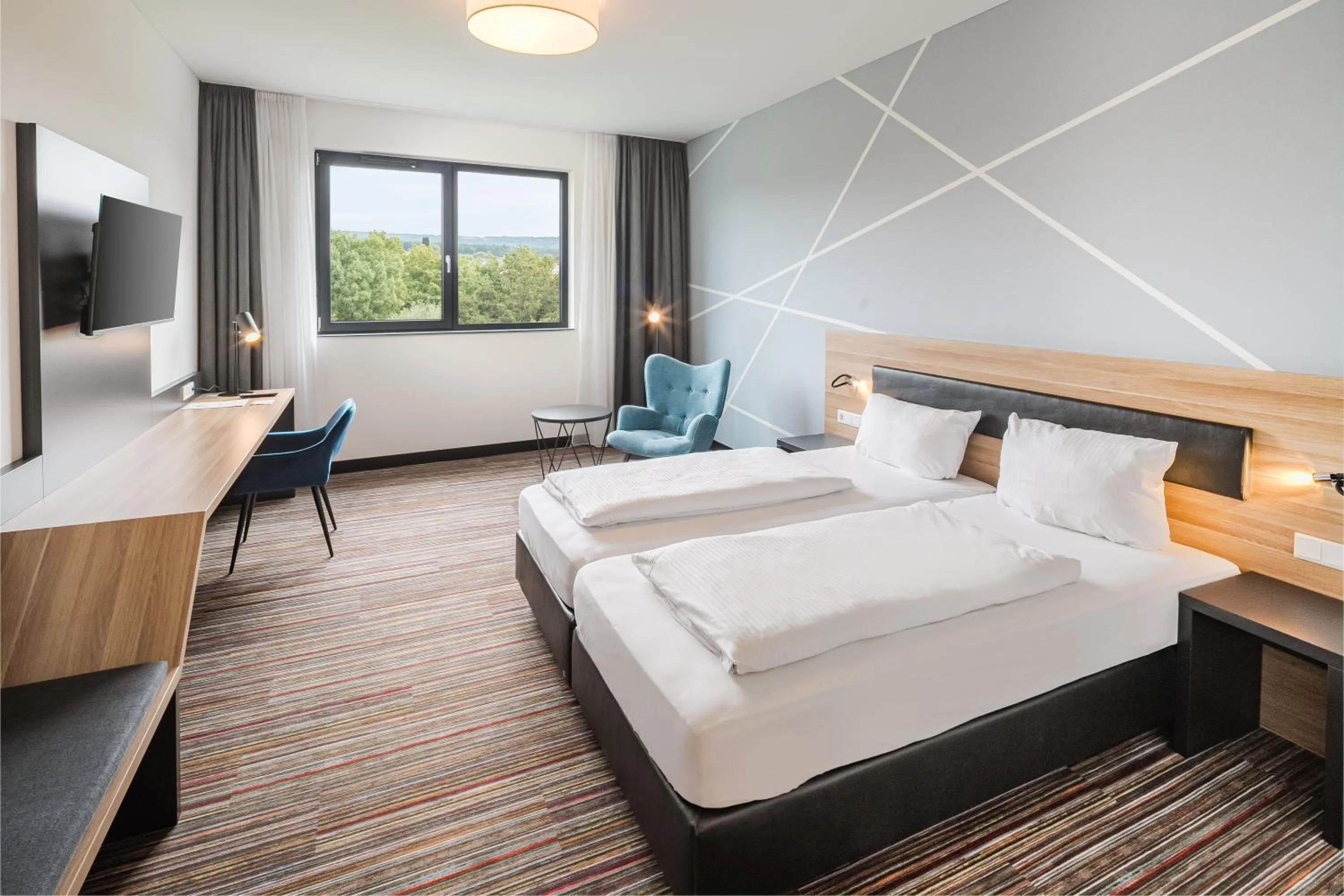 Photo of the whole room, Bed in N+S City Hotel Neumarkt