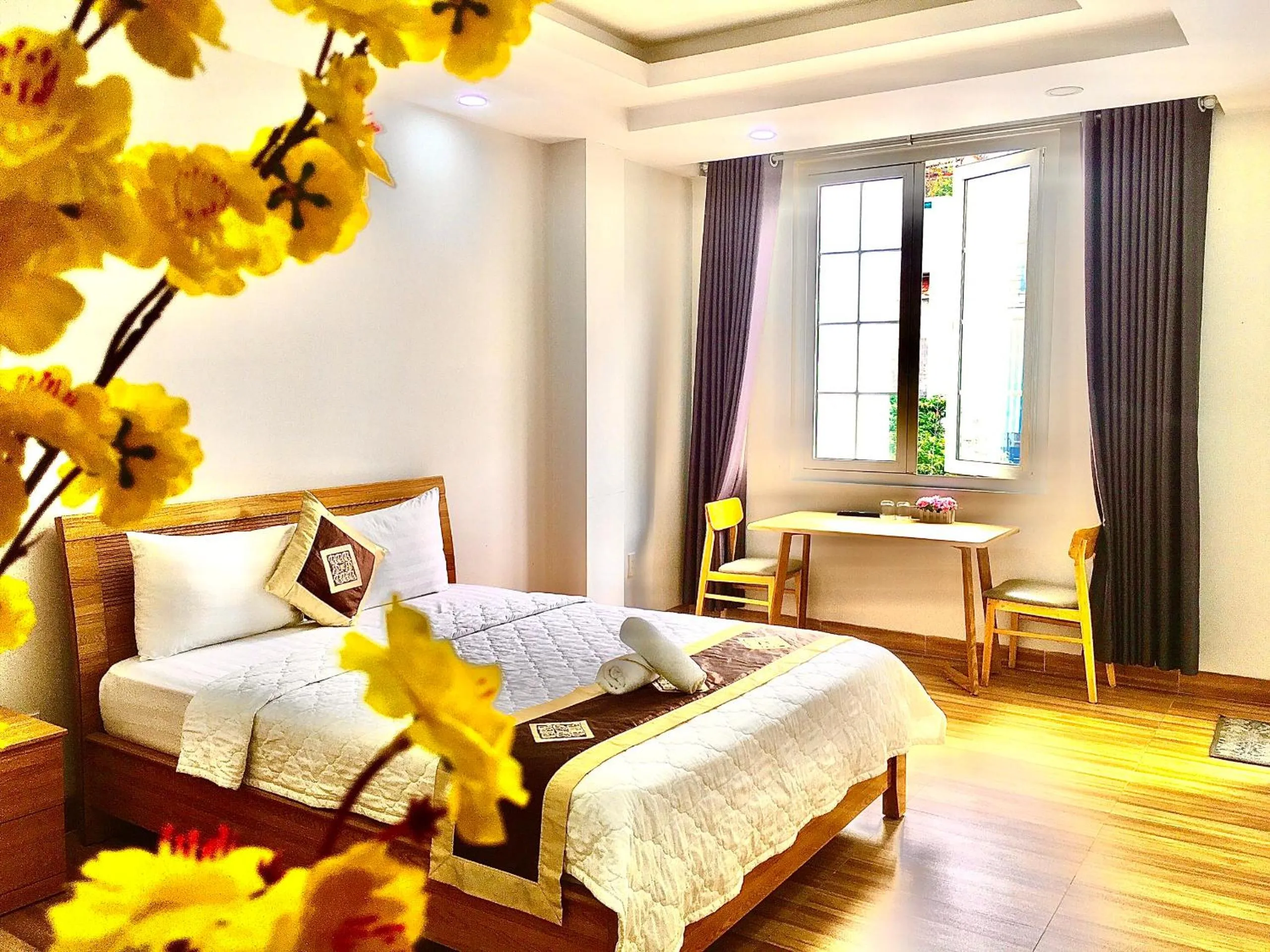 Photo of the whole room, Bed in The Lumiere near Tan Son Nhat Airport