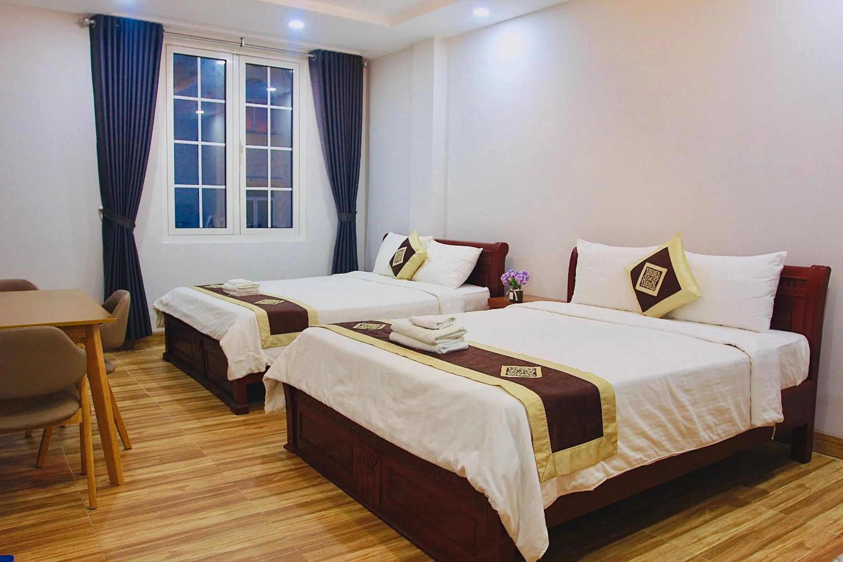 Photo of the whole room, Bed in The Lumiere near Tan Son Nhat Airport