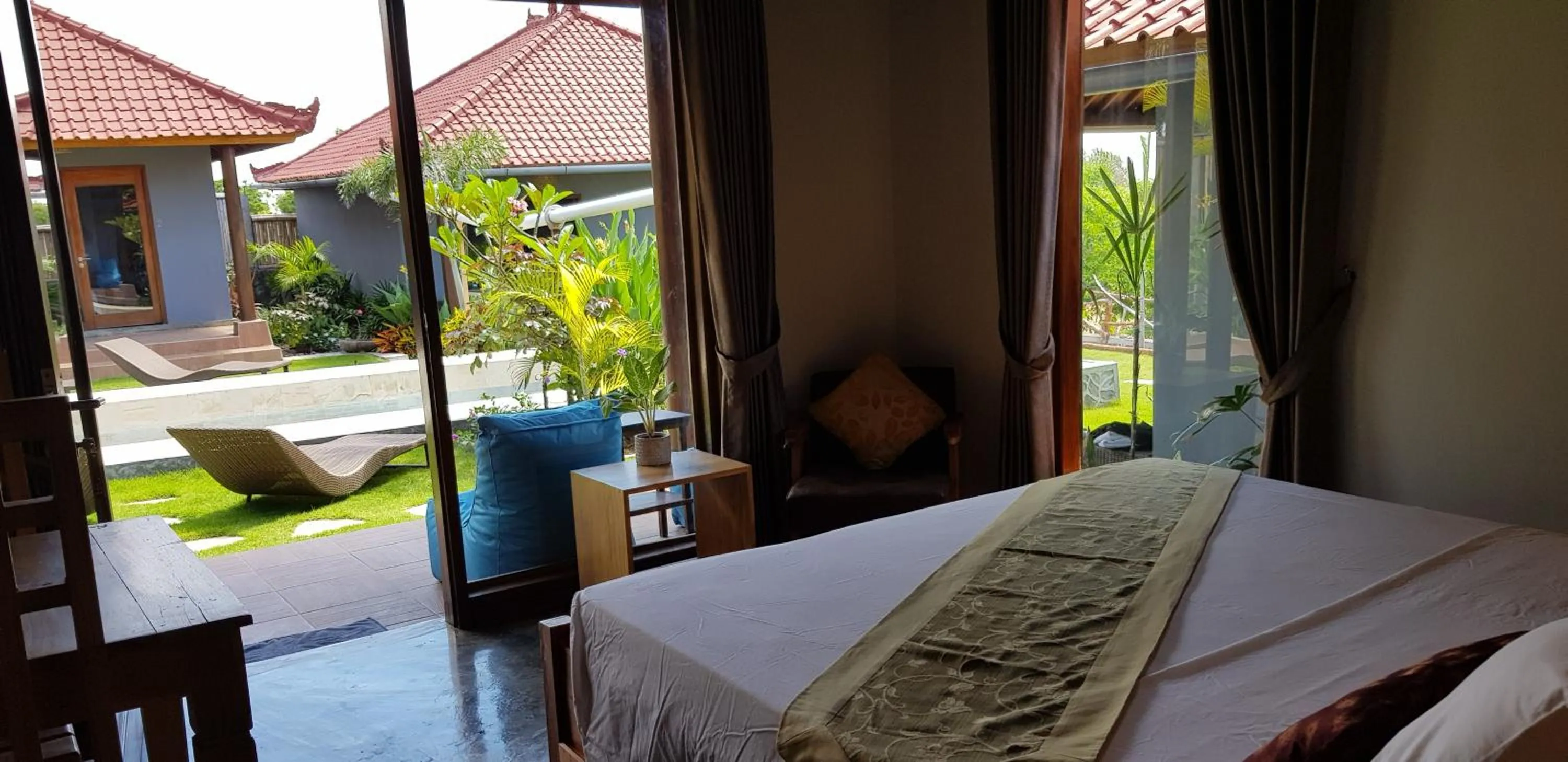 Patio, Bed in Ombak Resort at Ekas , a luxury surf and kite destination, Close to Inside Ekas beach