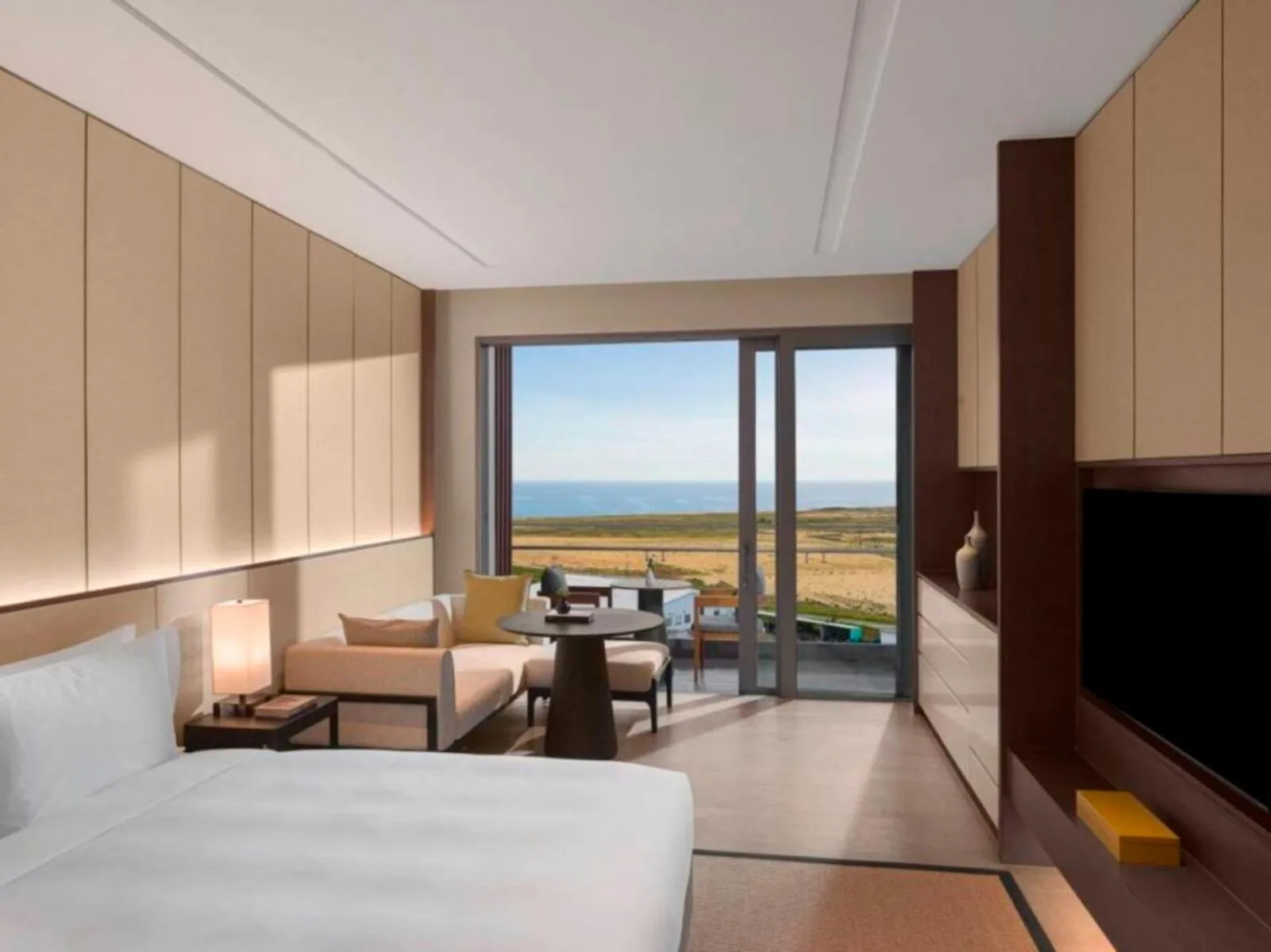 Bed in New World Hoiana Hotel