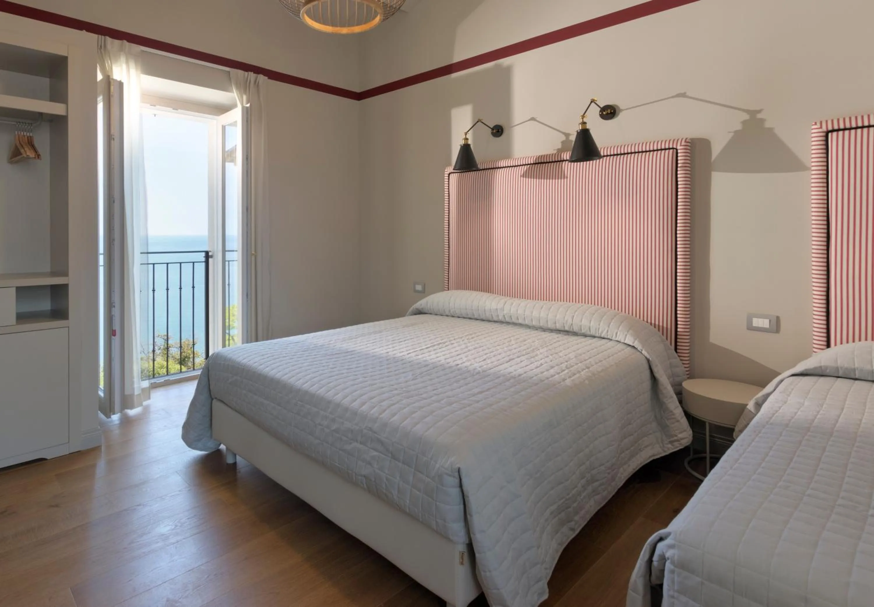 Bed in Diecidodici BoutiqueRooms