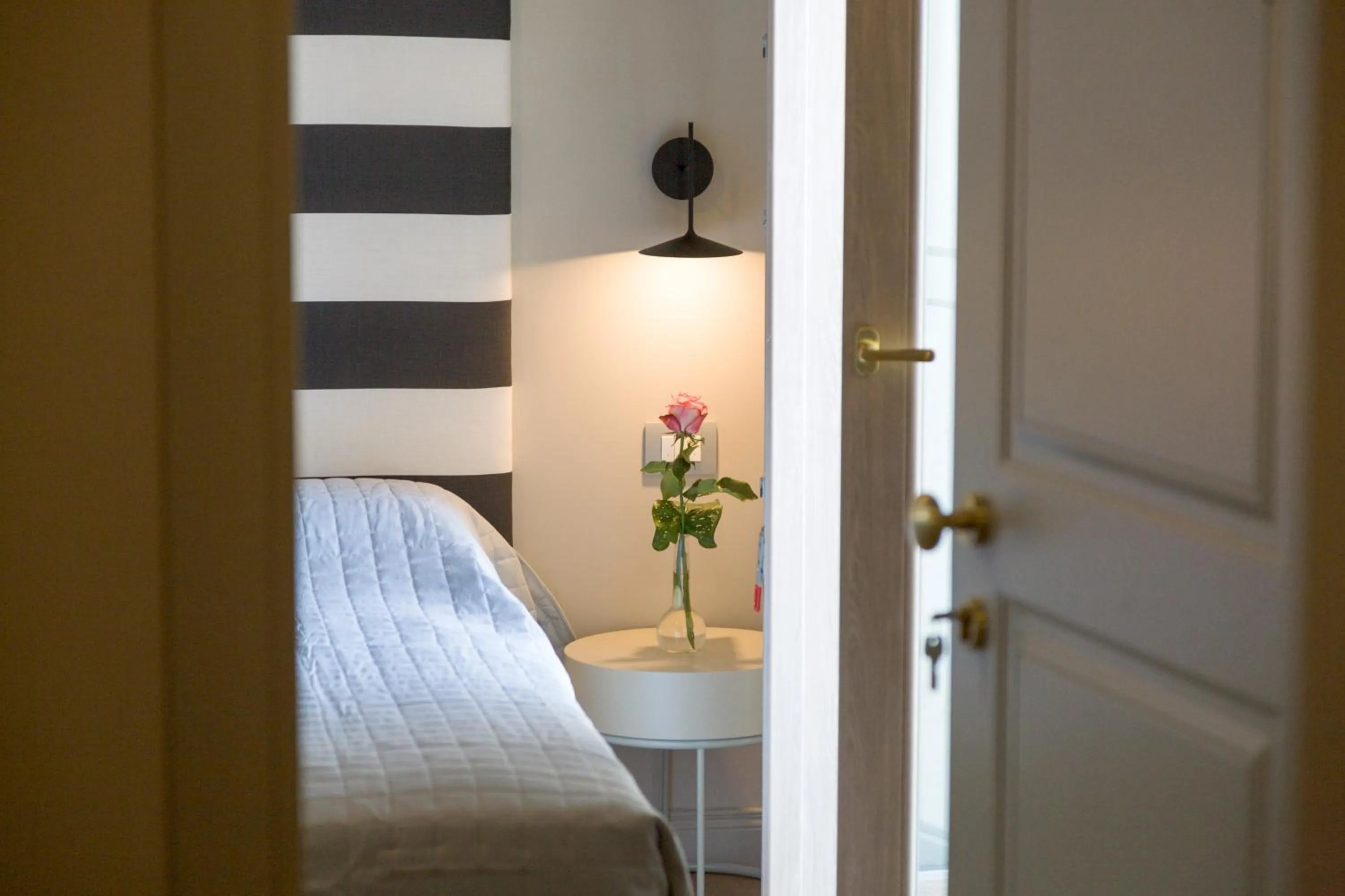 Bed in Diecidodici BoutiqueRooms